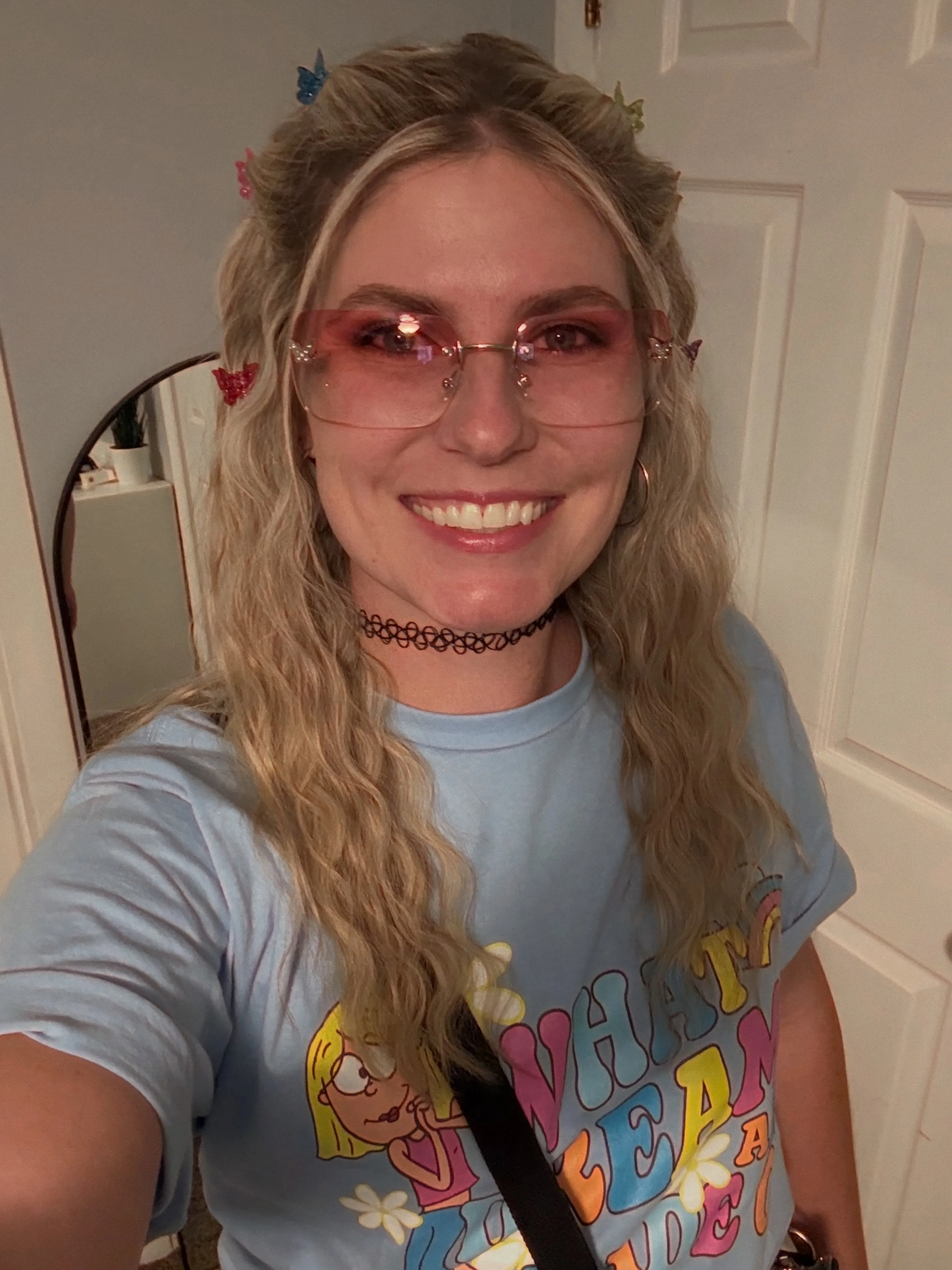 Crimped blonde hair styled half up
