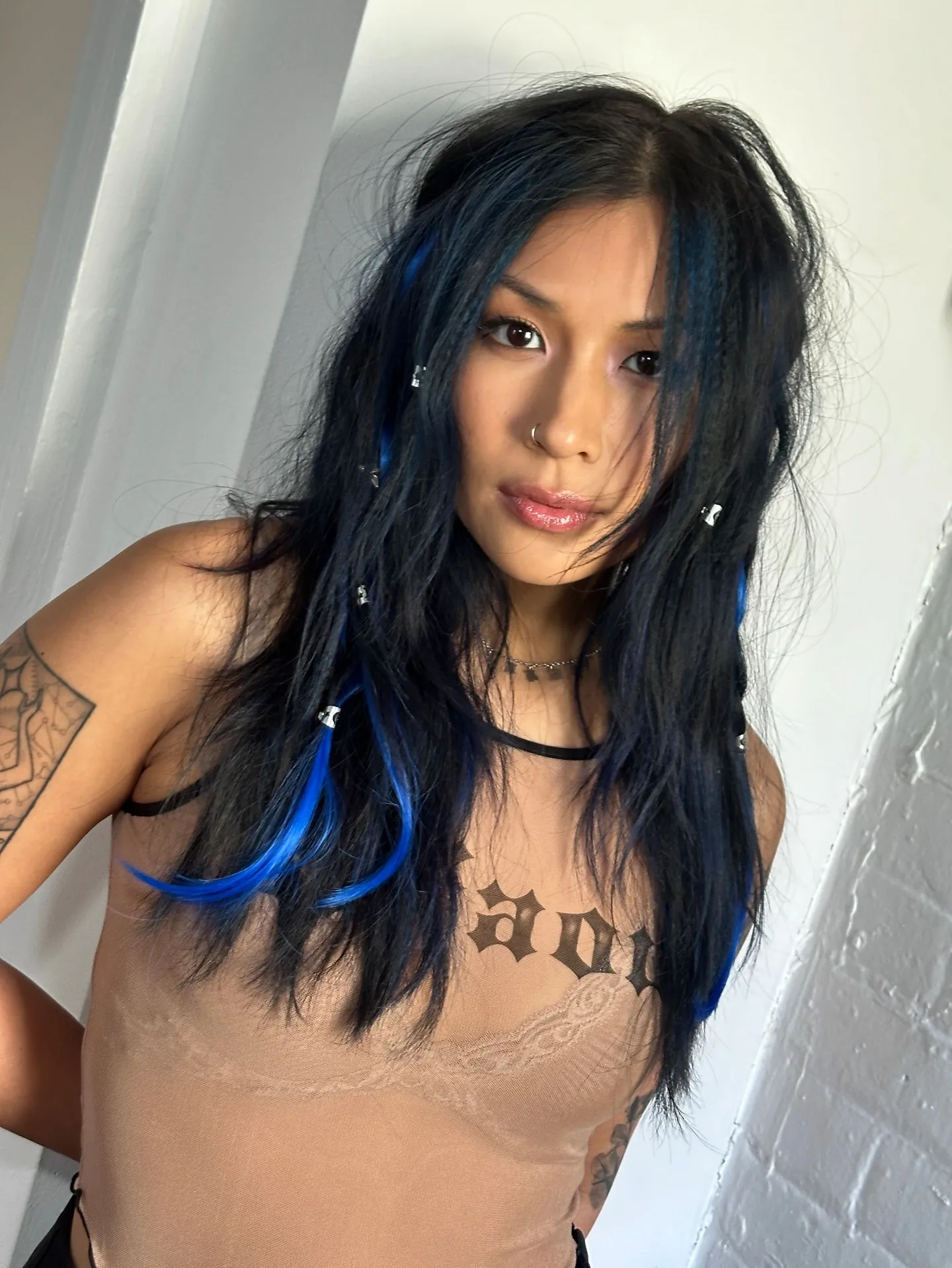 Dark layered hair with blue crimped accent pieces