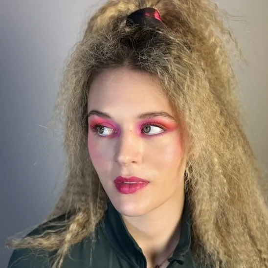 Long full crimped hair with lifted crown