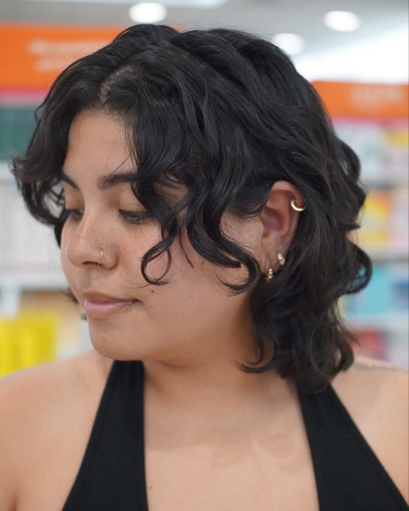 Wavy mullet bixie with longer back and face-framing waves
