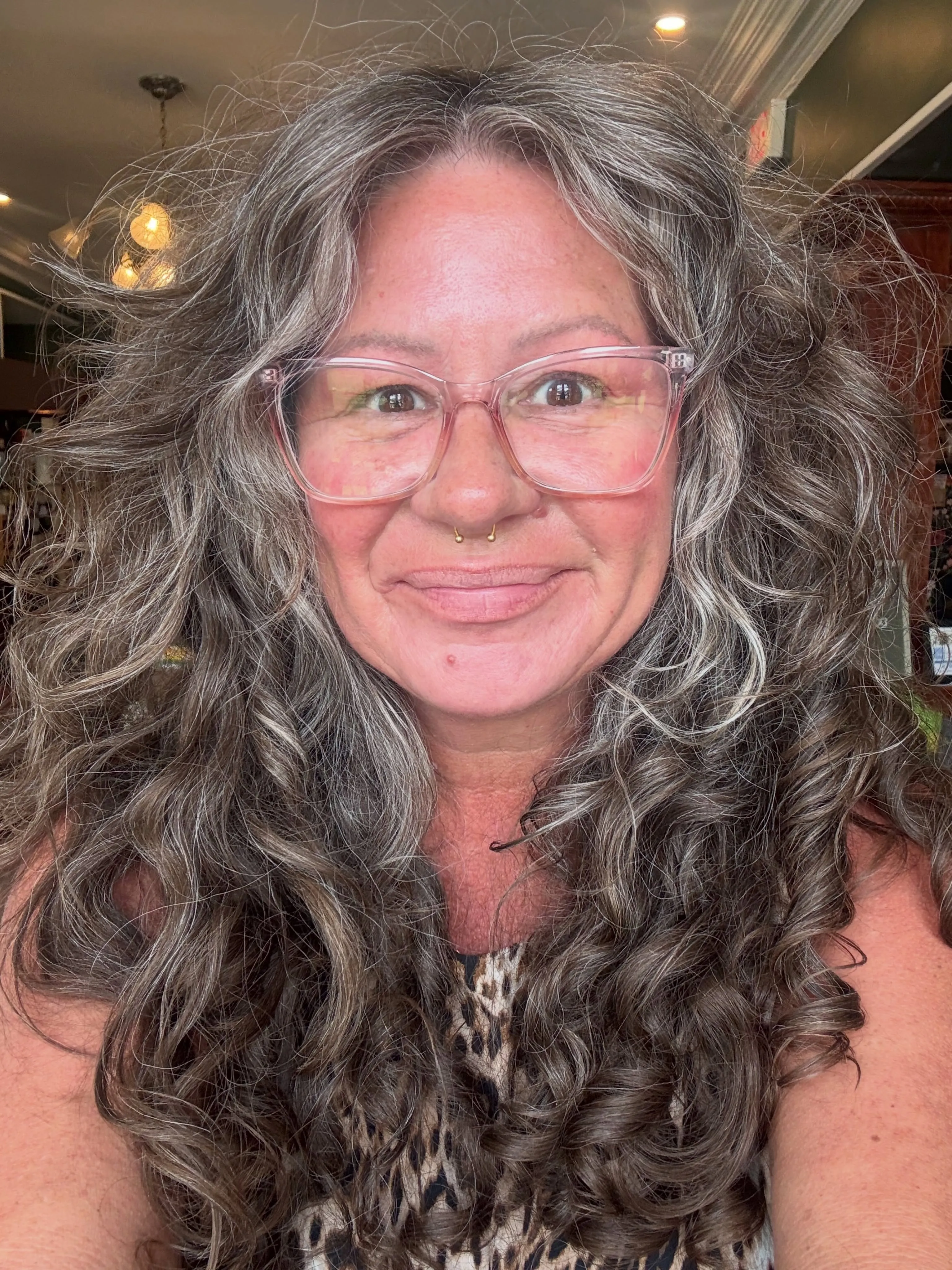 Long silver curls with loose layered movement