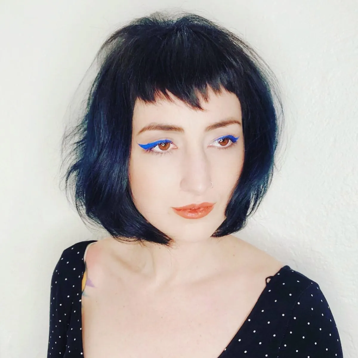 Dark blunt mini bob with micro fringe