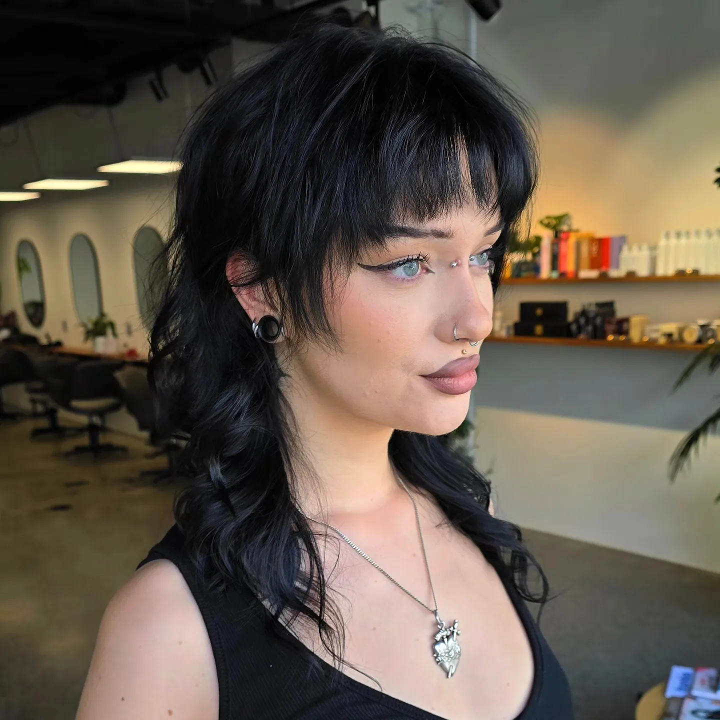Dark wolf cut with short fringe and braided lengths