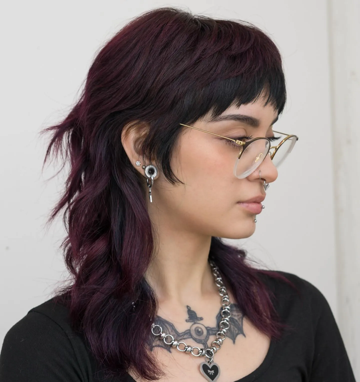 Dark layered mullet with short fringe