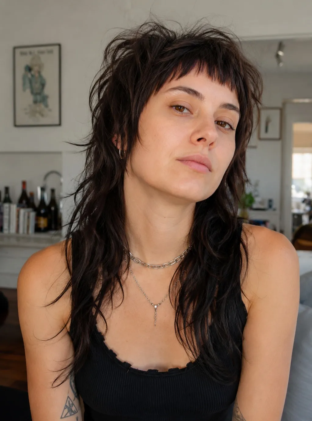 Dark wet look mullet with piecey fringe