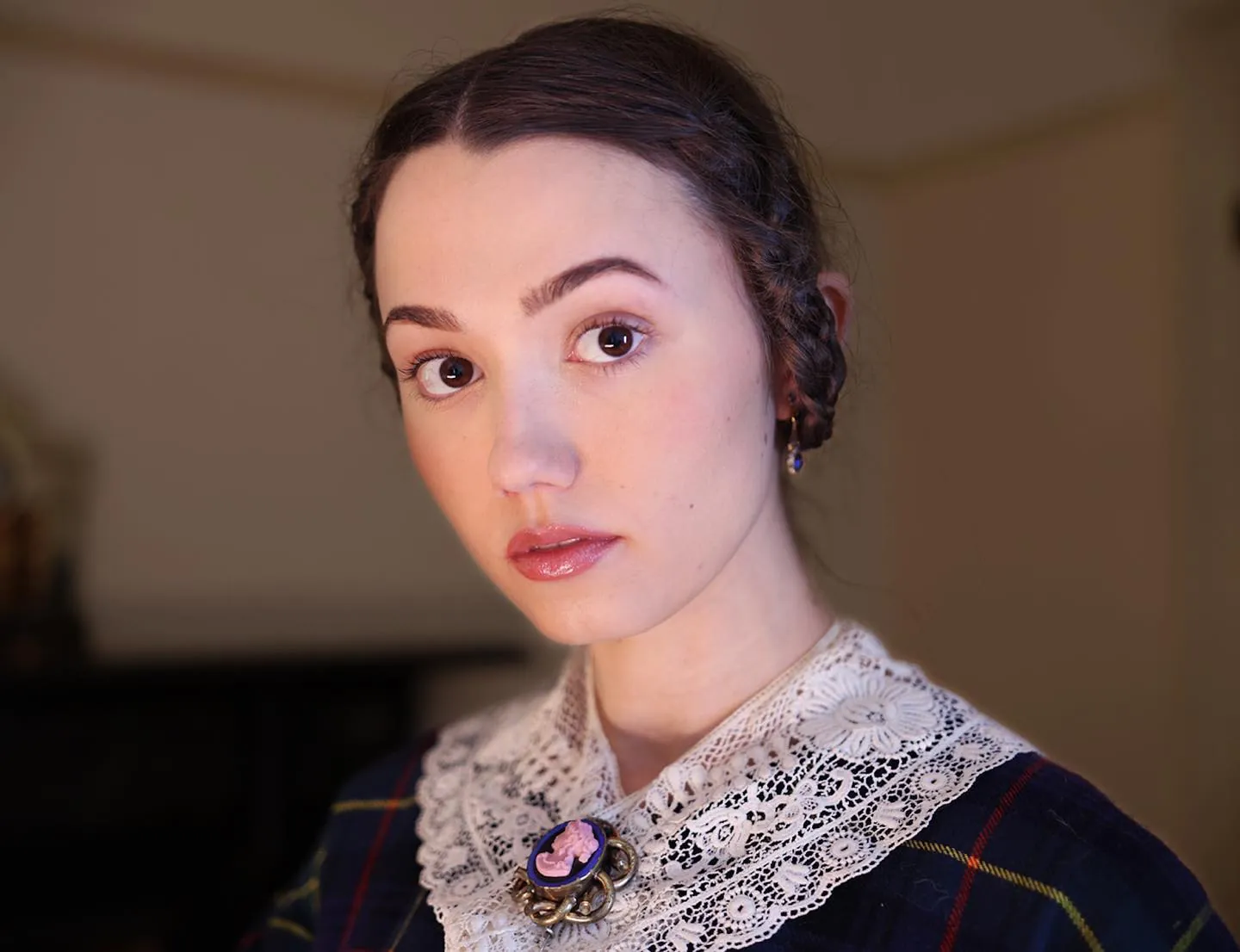 low braided coil Edwardian-inspired hairstyle