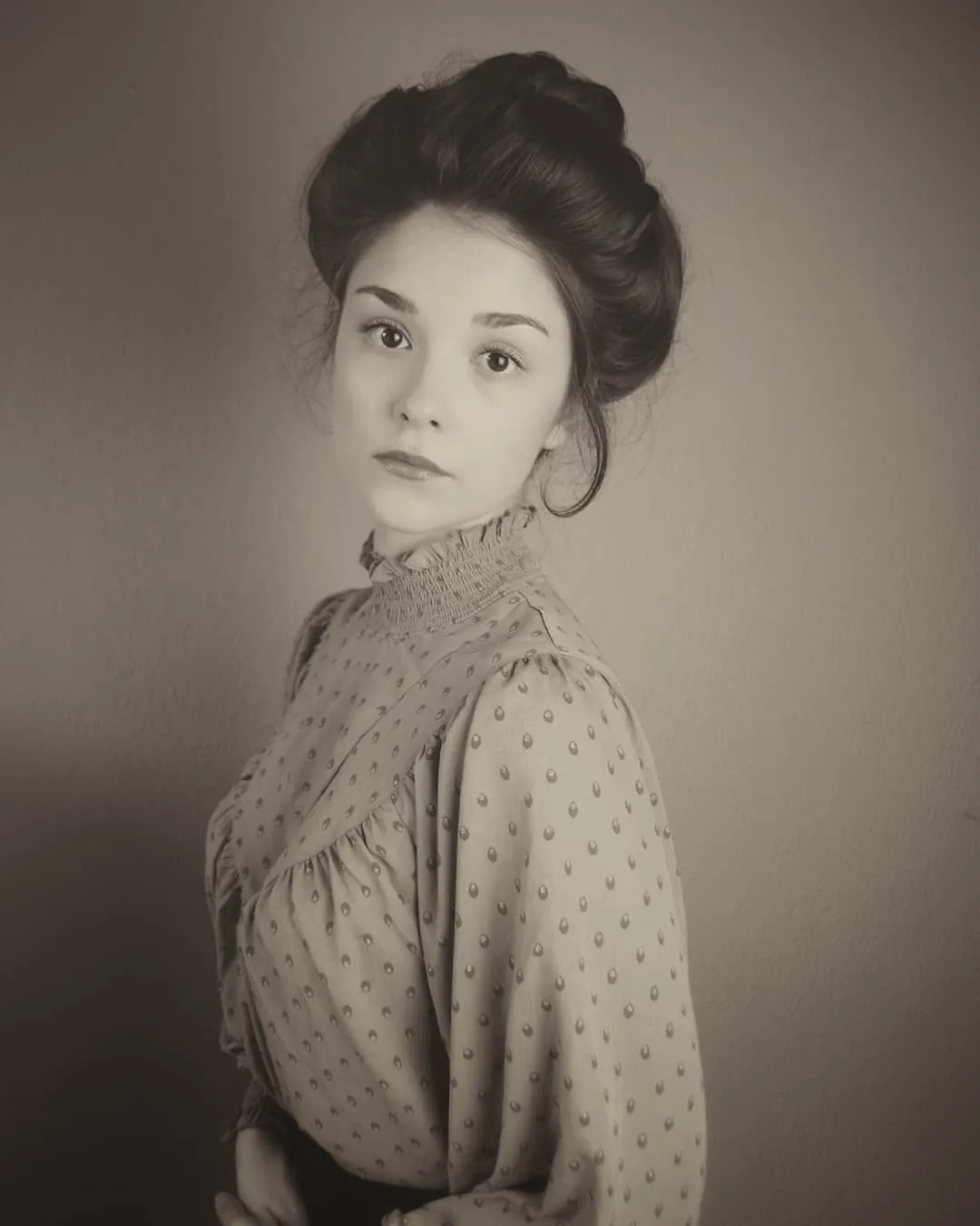 soft pompadour bun Edwardian-inspired hairstyle