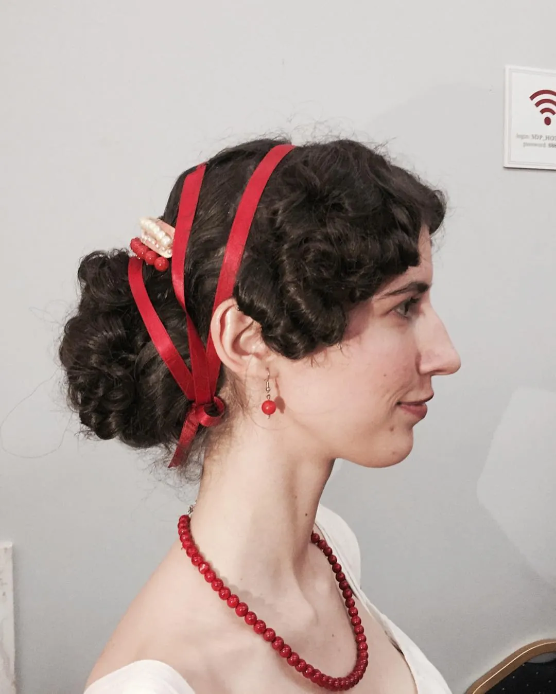 ribbon-wrapped bun Edwardian-inspired hairstyle