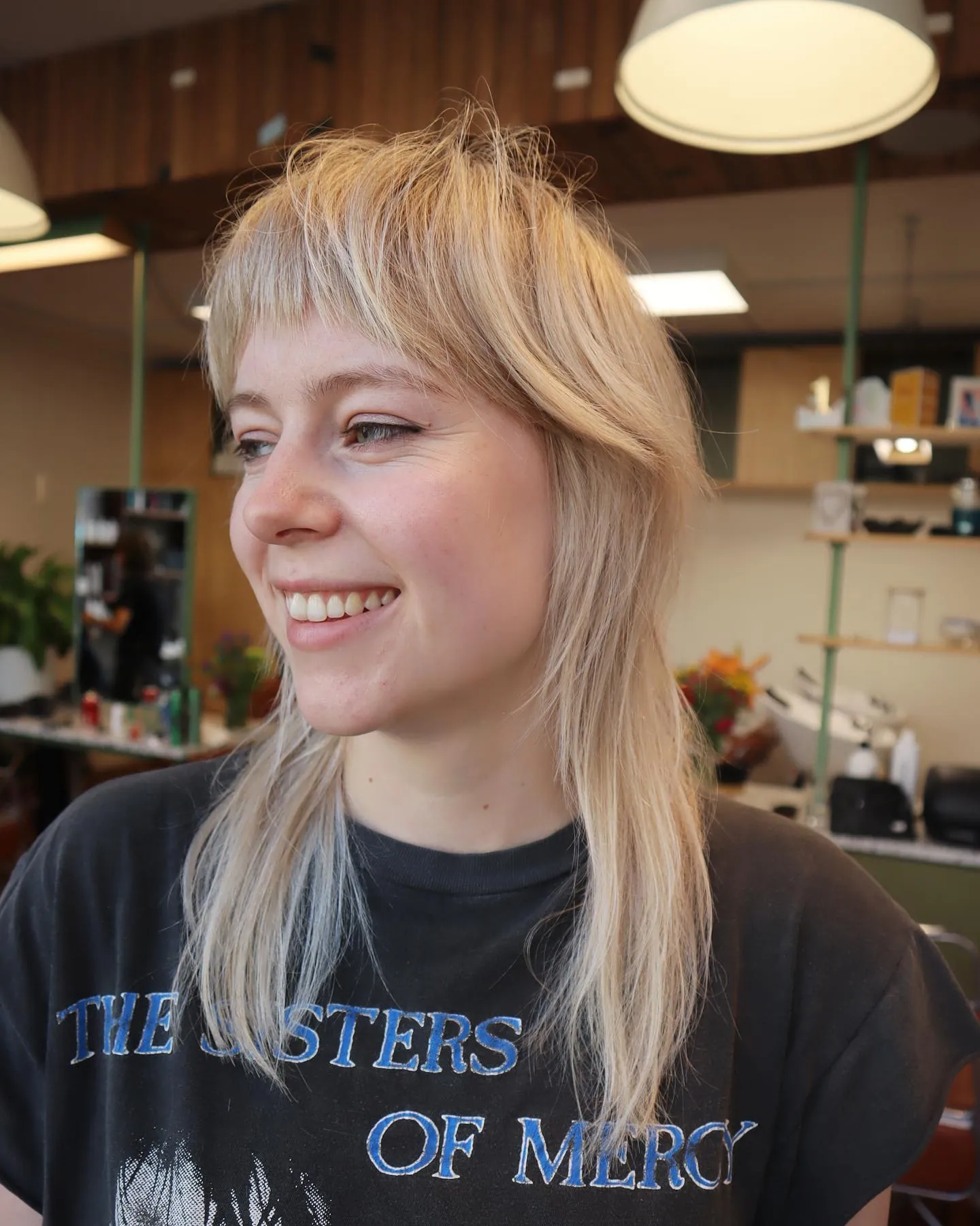 Blonde straight mullet with short fringe and longer back layers