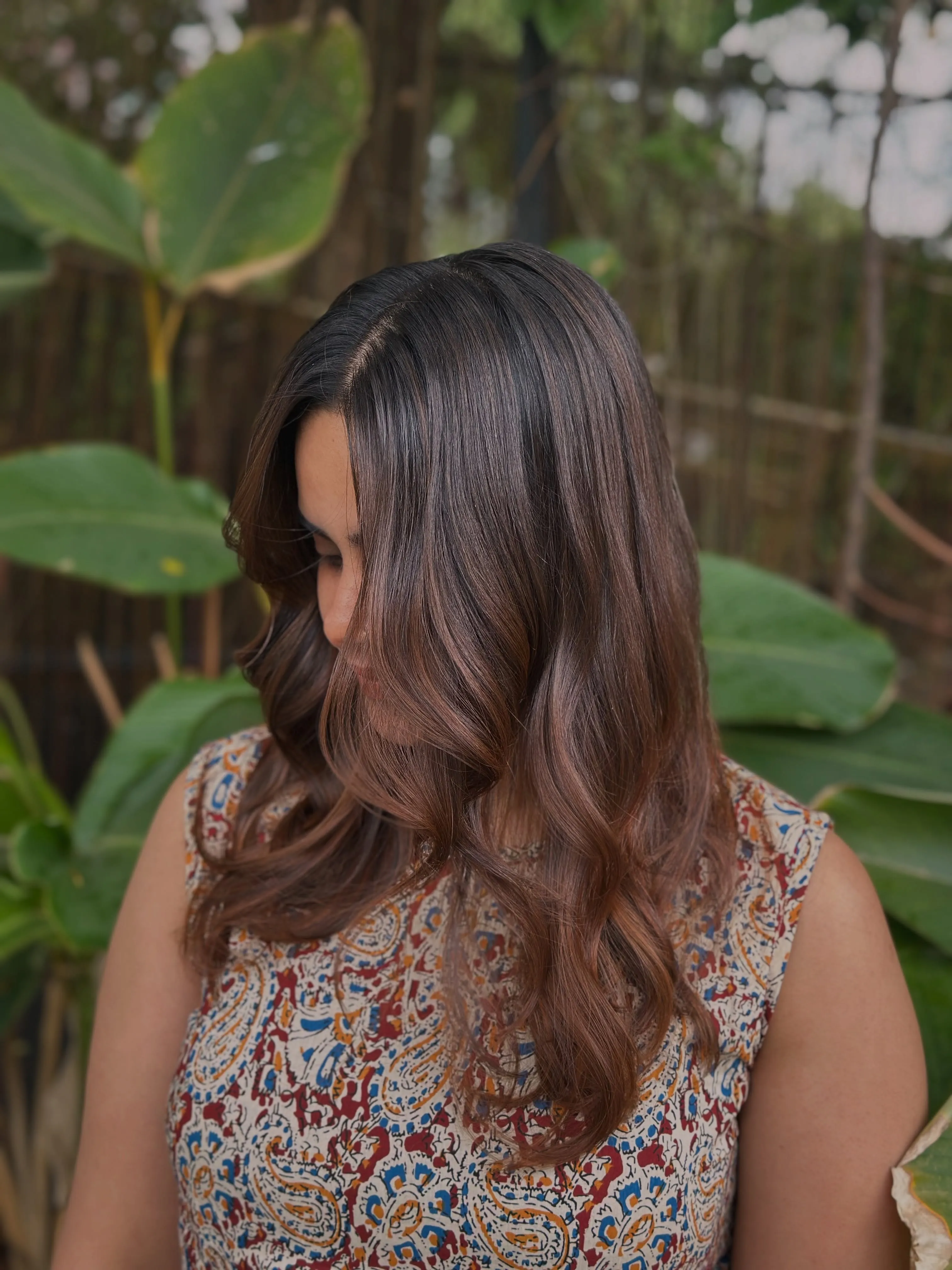 Long brunette waves with soft side part