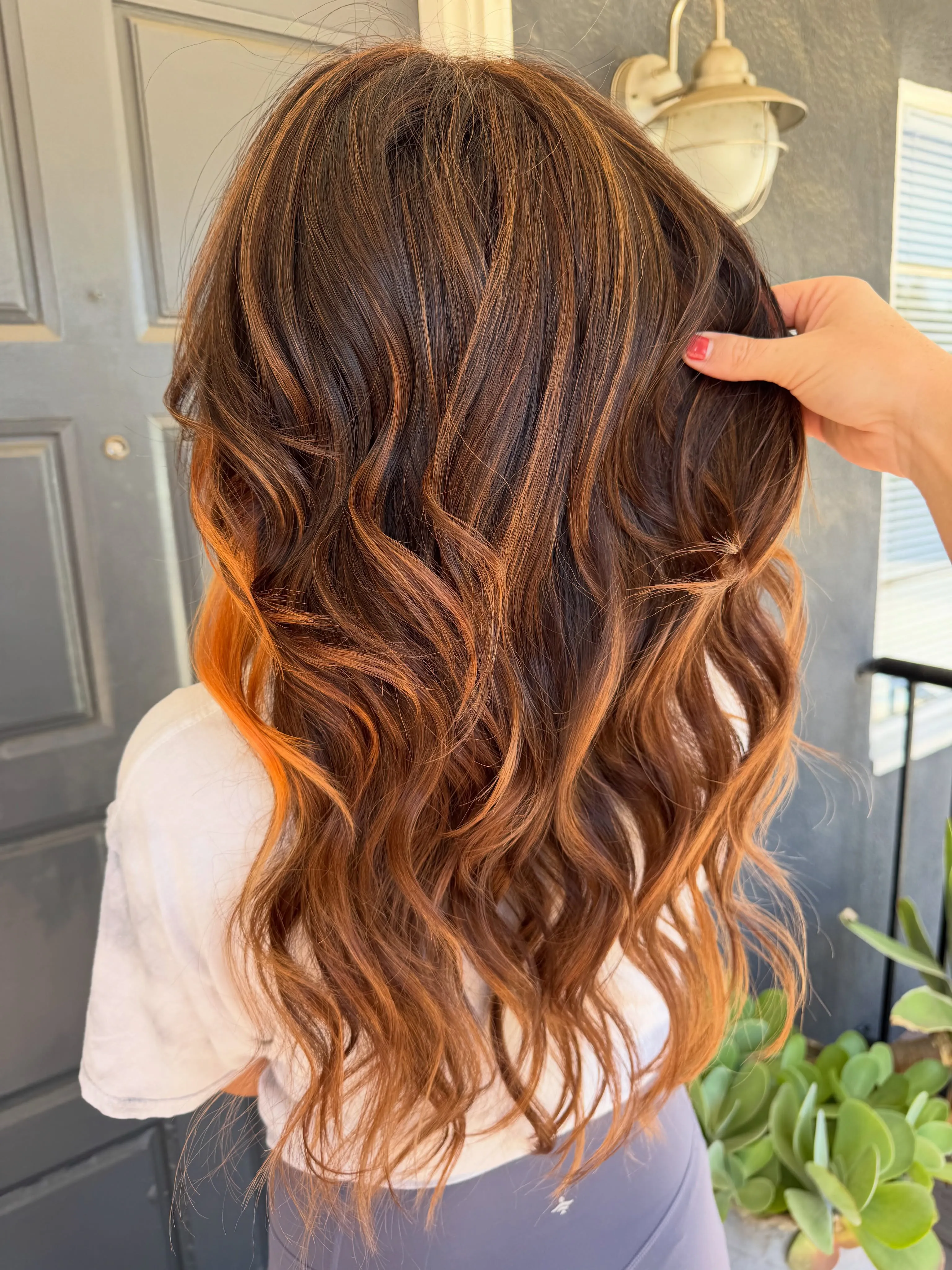 Medium copper balayage waves shown from the back