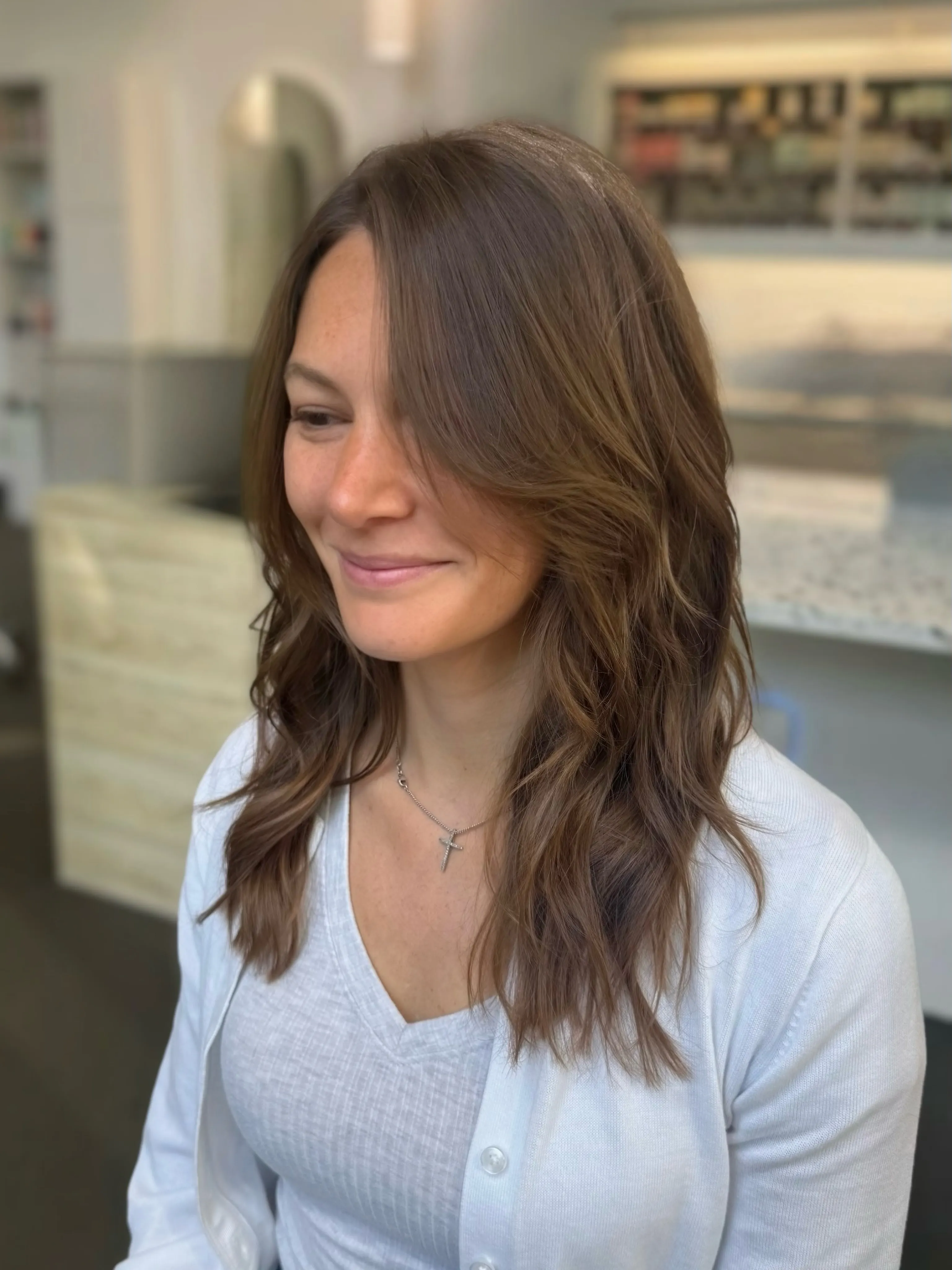 Medium brunette layers with soft side fringe