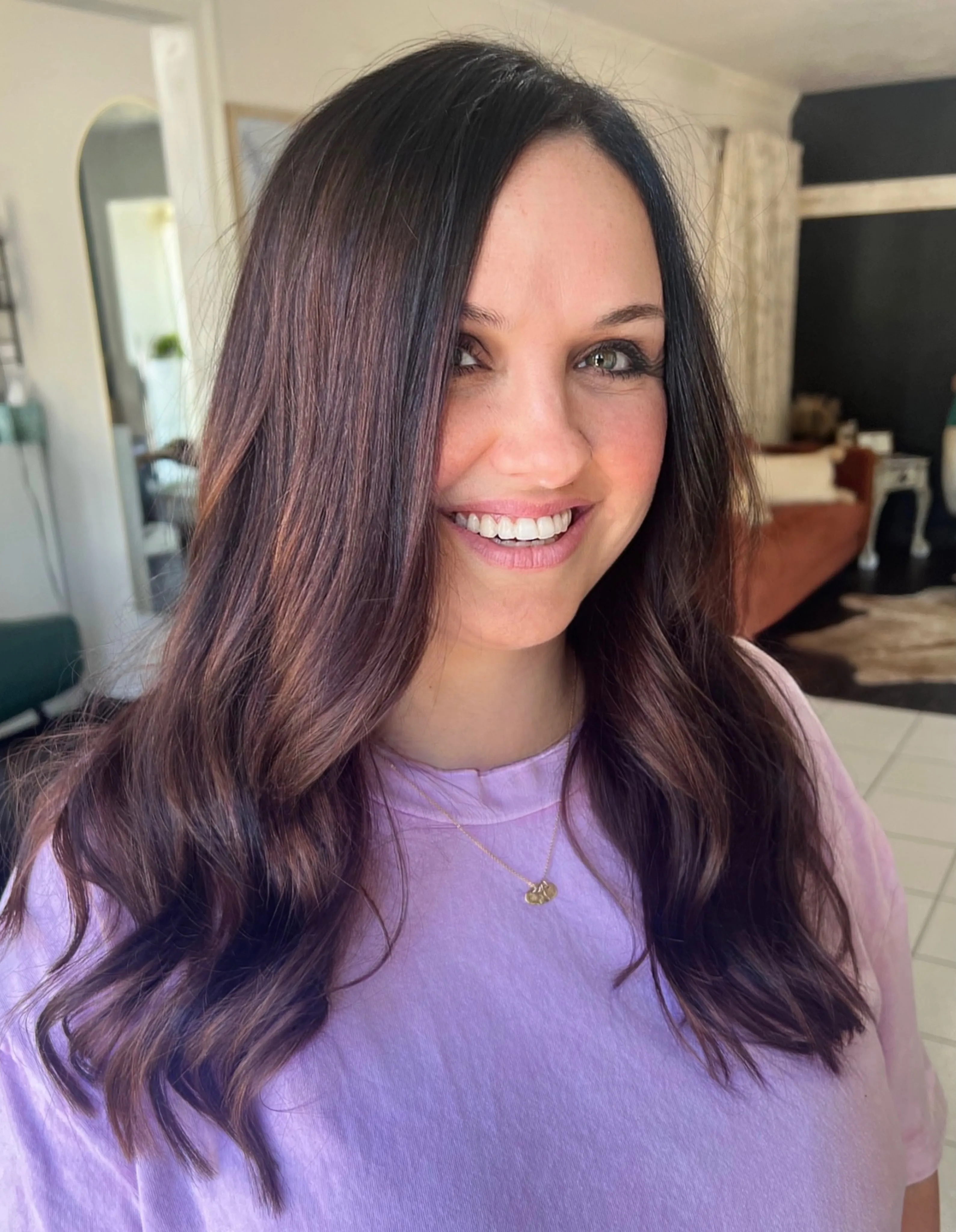 Long dark brunette waves with soft centre part