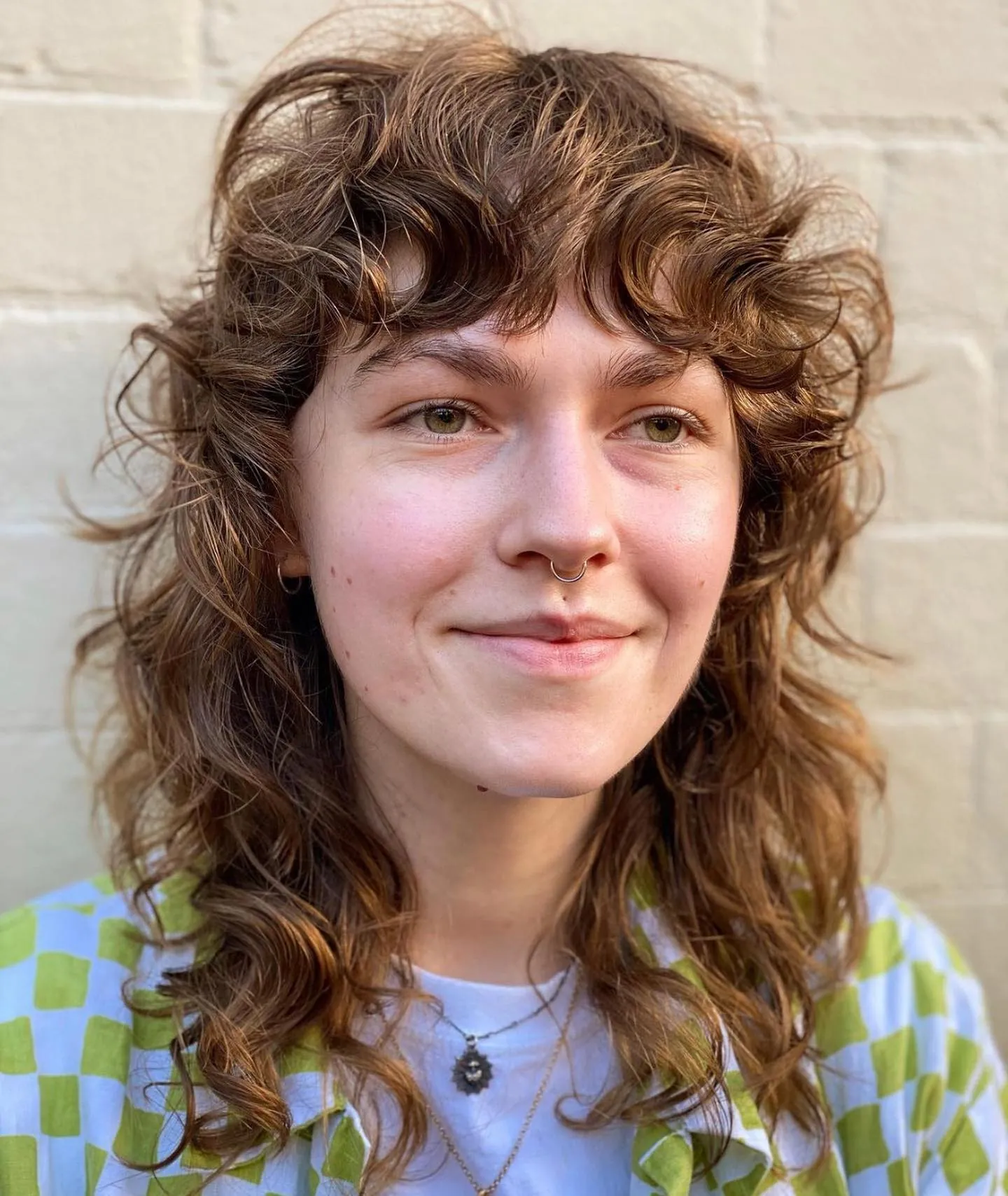 Medium textured shag with wavy layers and short fringe