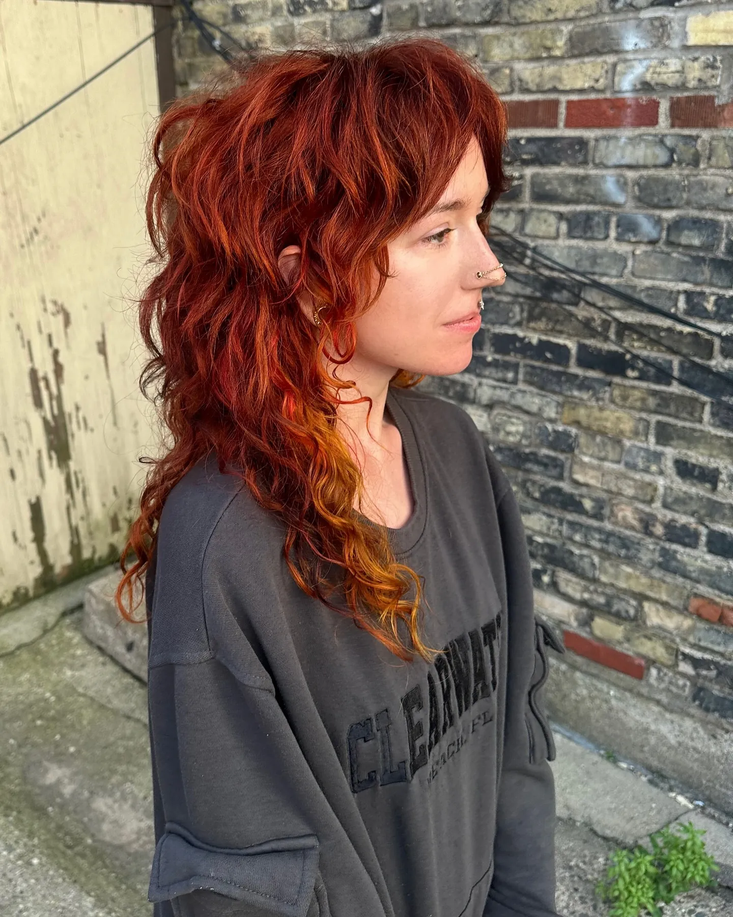 Long wavy mullet shag with short crown layers and tapered length
