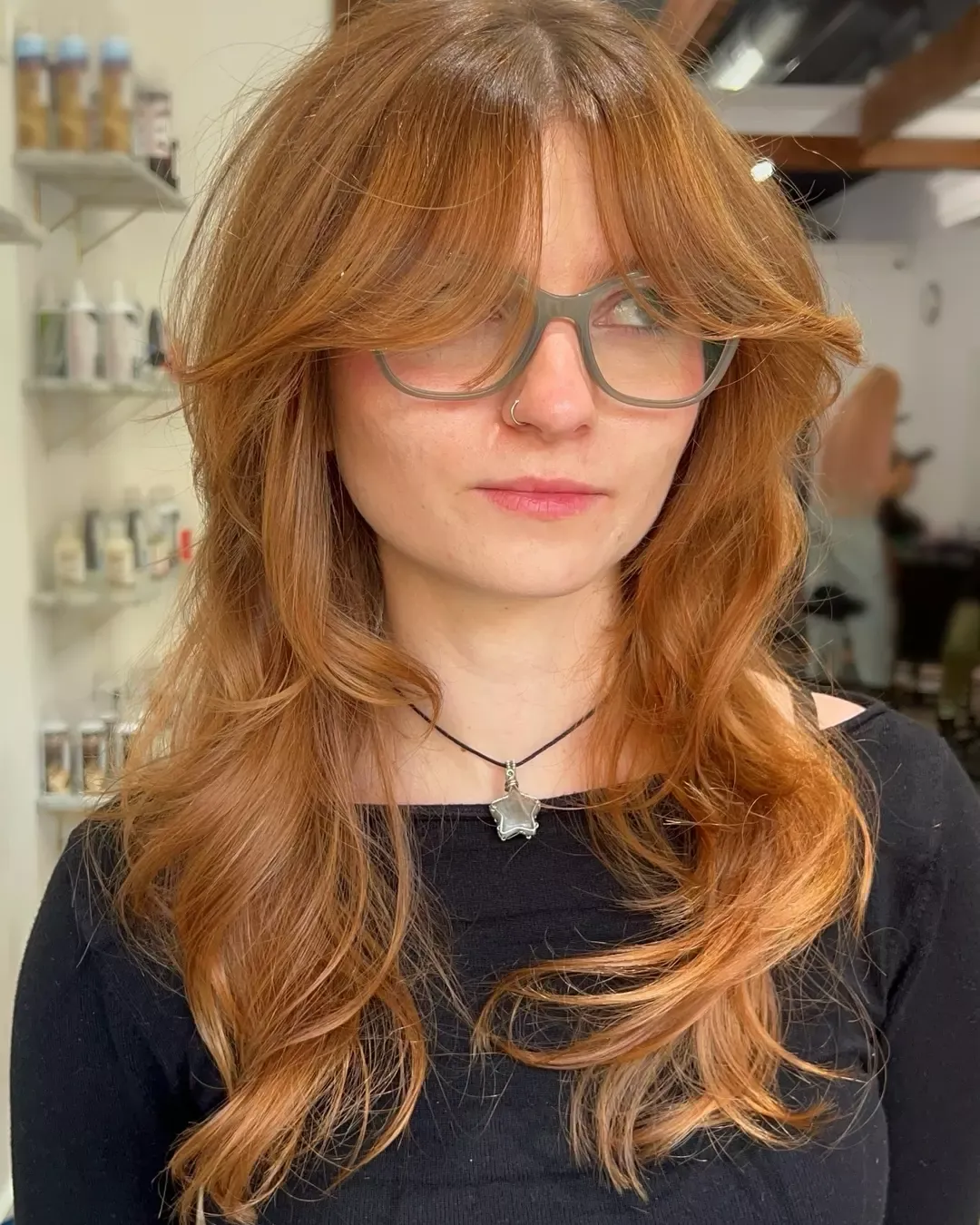 Shaggy copper layers with long curtain bangs