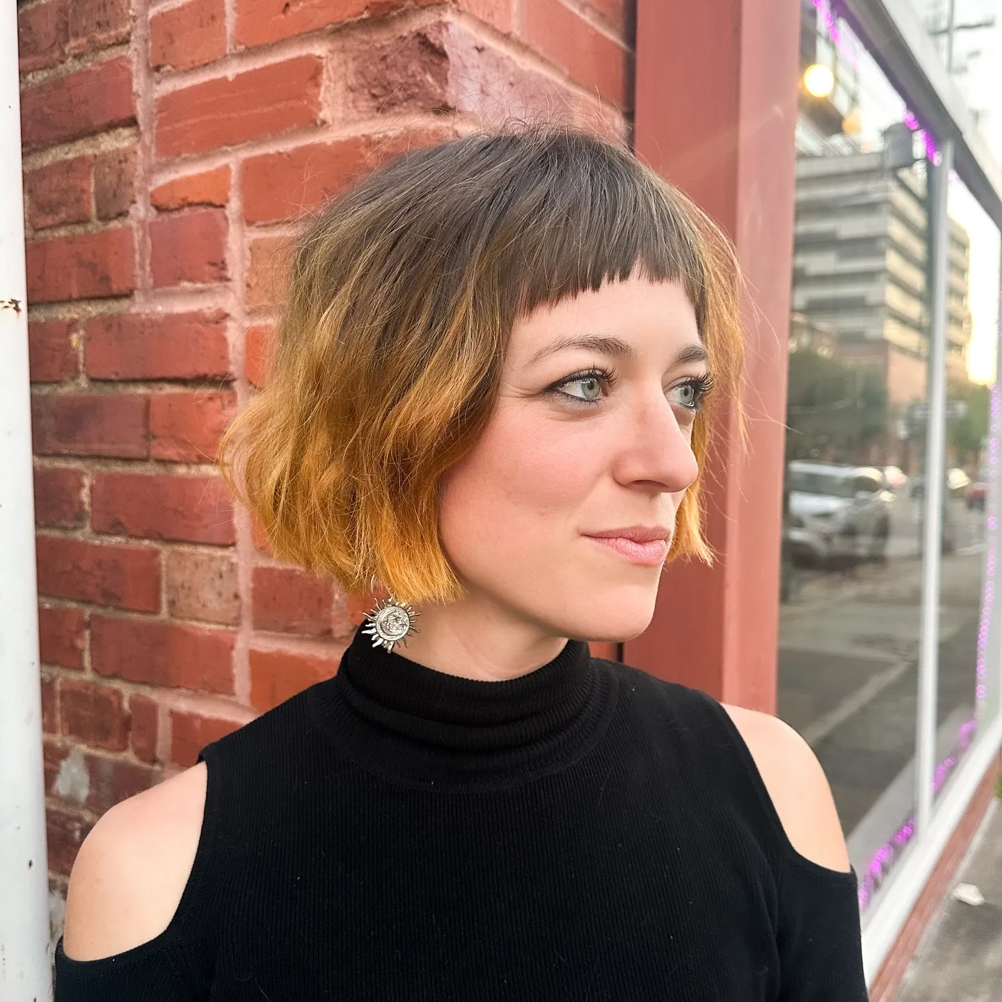 Short bob with micro fringe and textured flipped ends