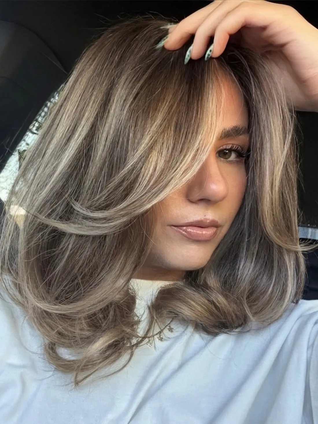 highlighted butterfly layers haircut