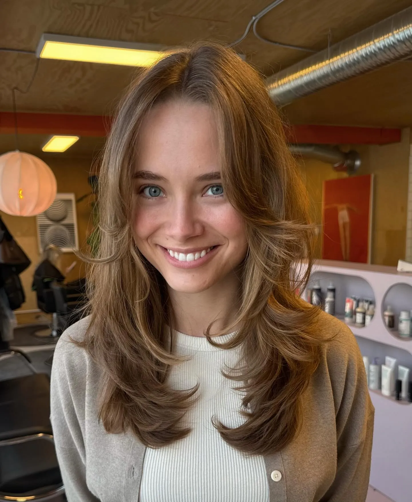 bouncy face framing haircut