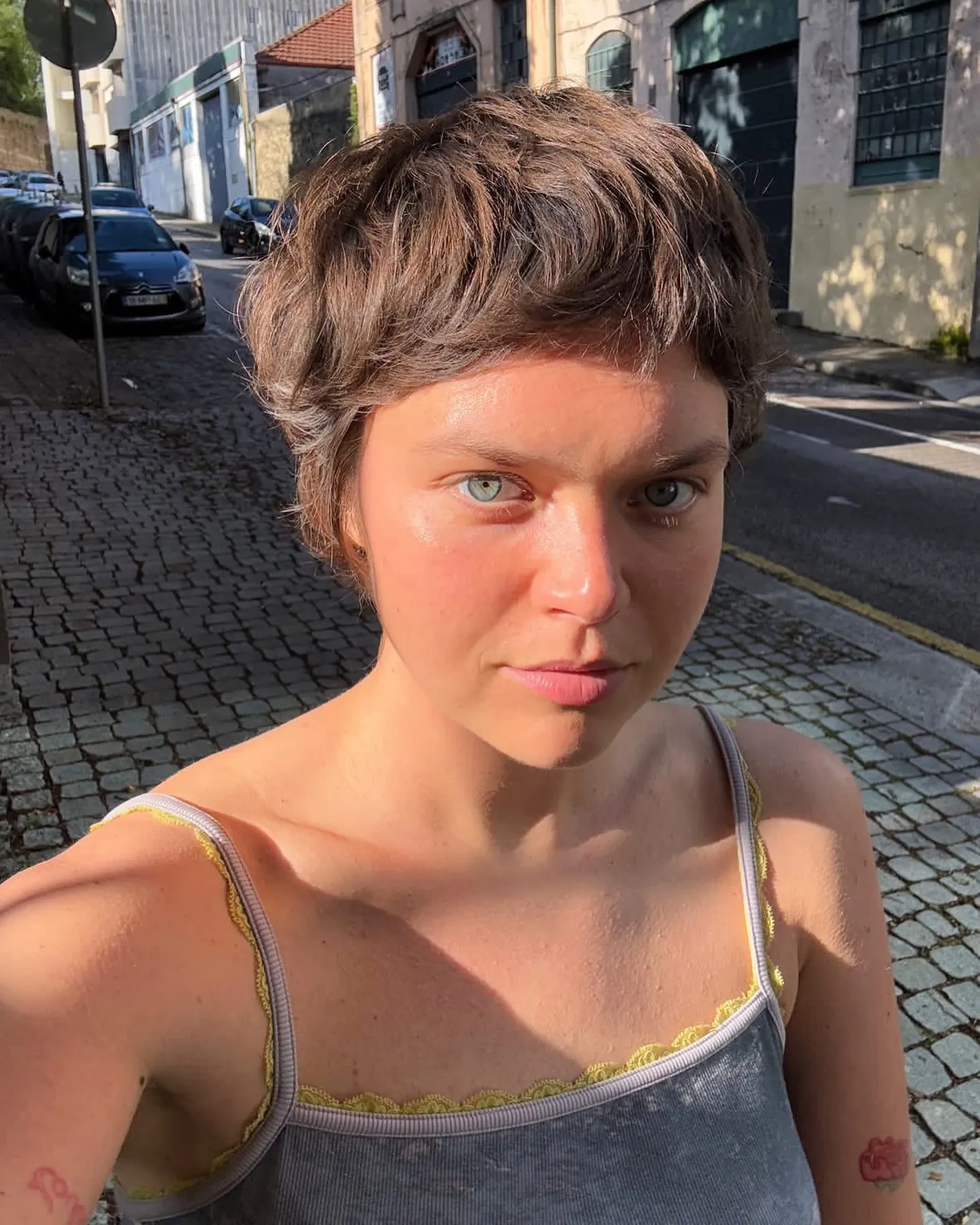 Soft brown pixie with short micro fringe and natural texture