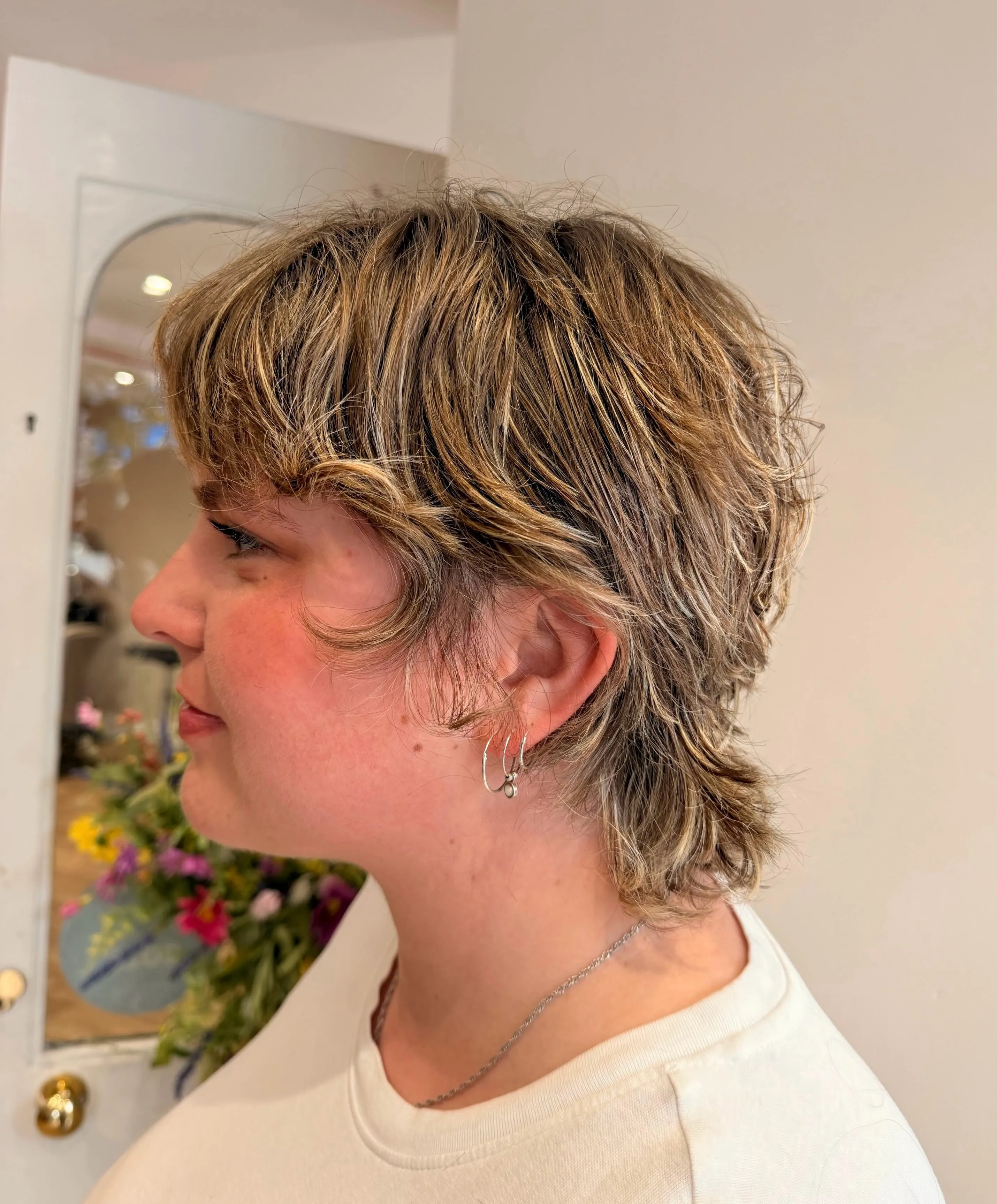 Shaggy pixie with longer nape and textured fringe