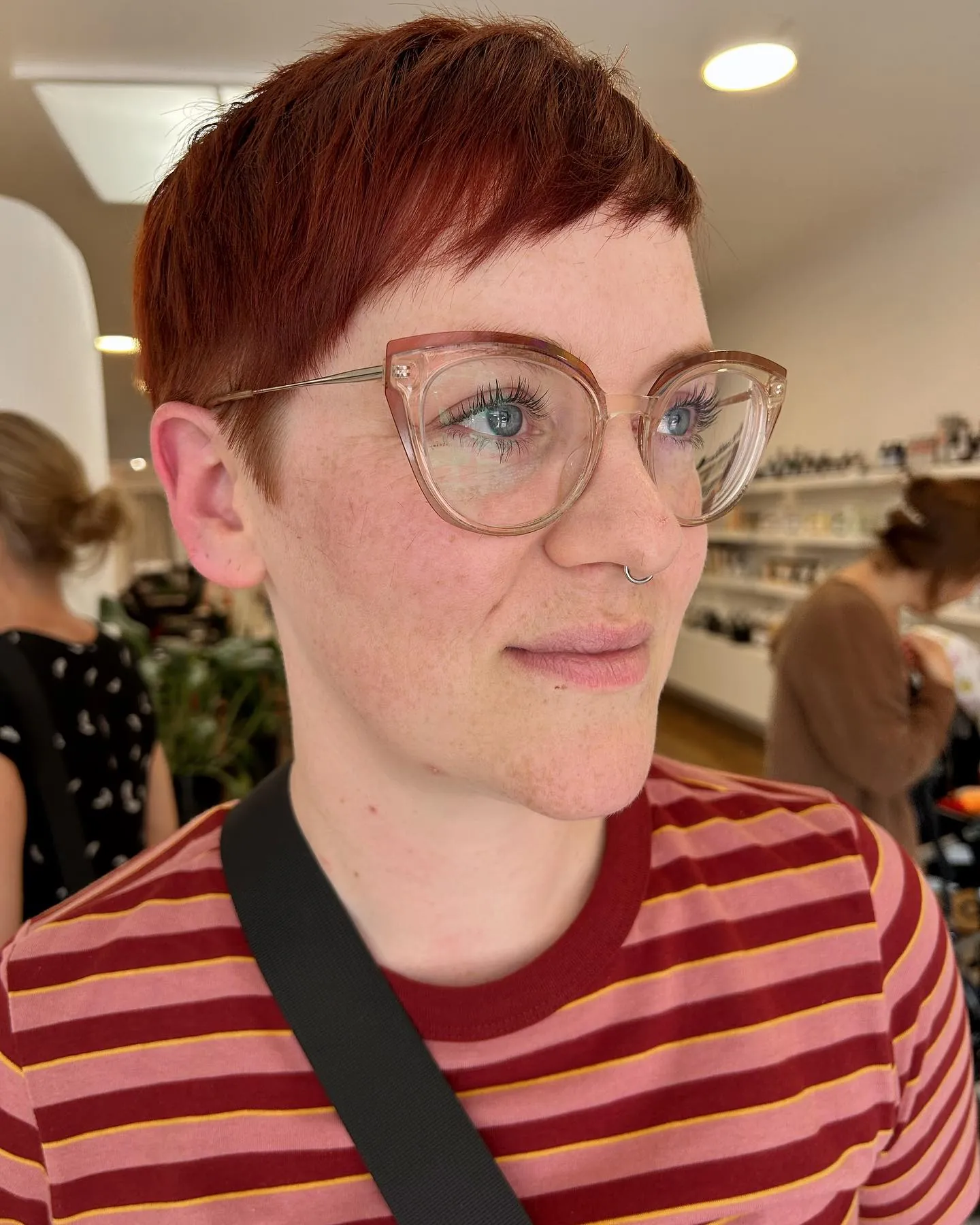 Cropped copper pixie with short side fringe