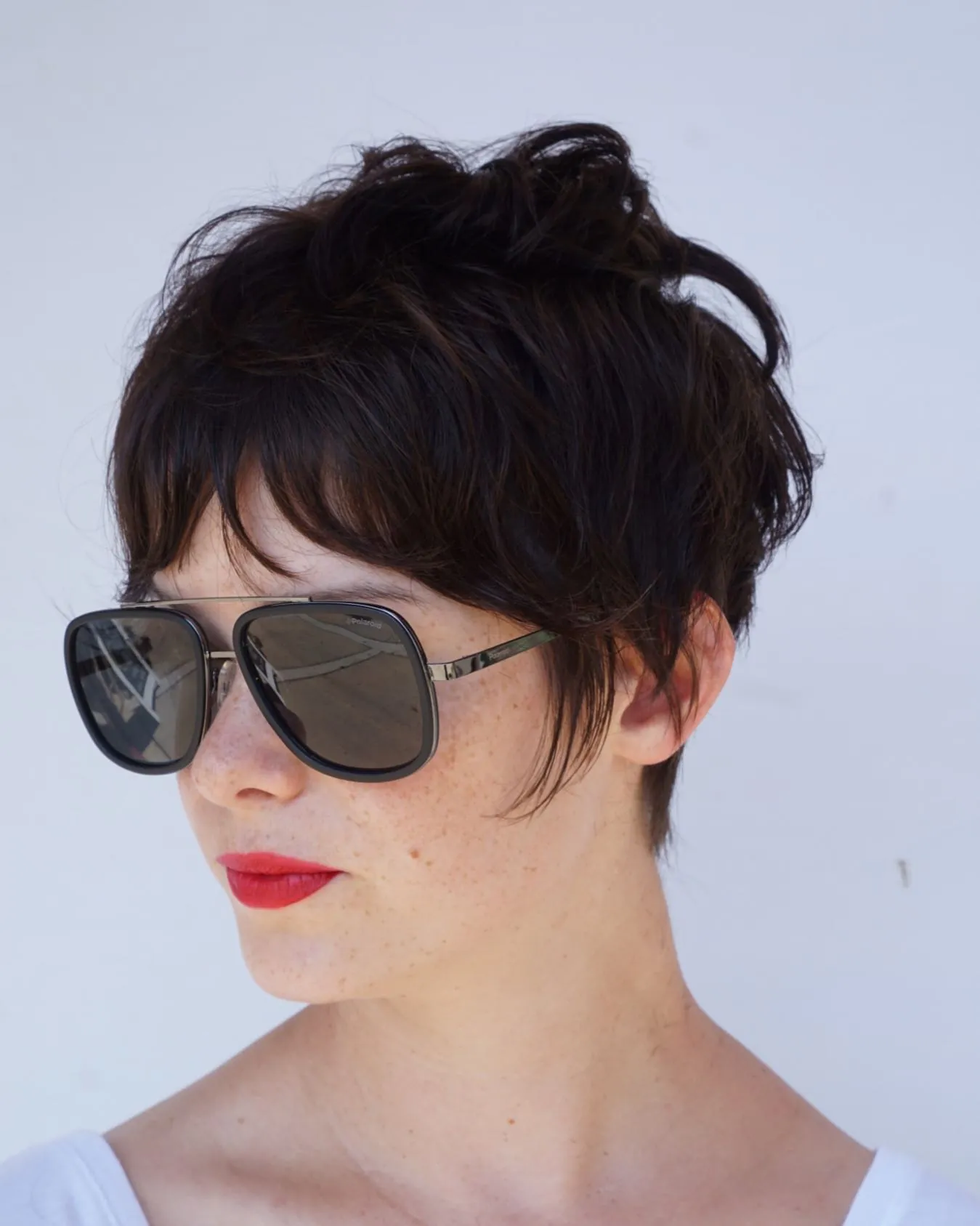 Tousled pixie with longer wavy top and short sides