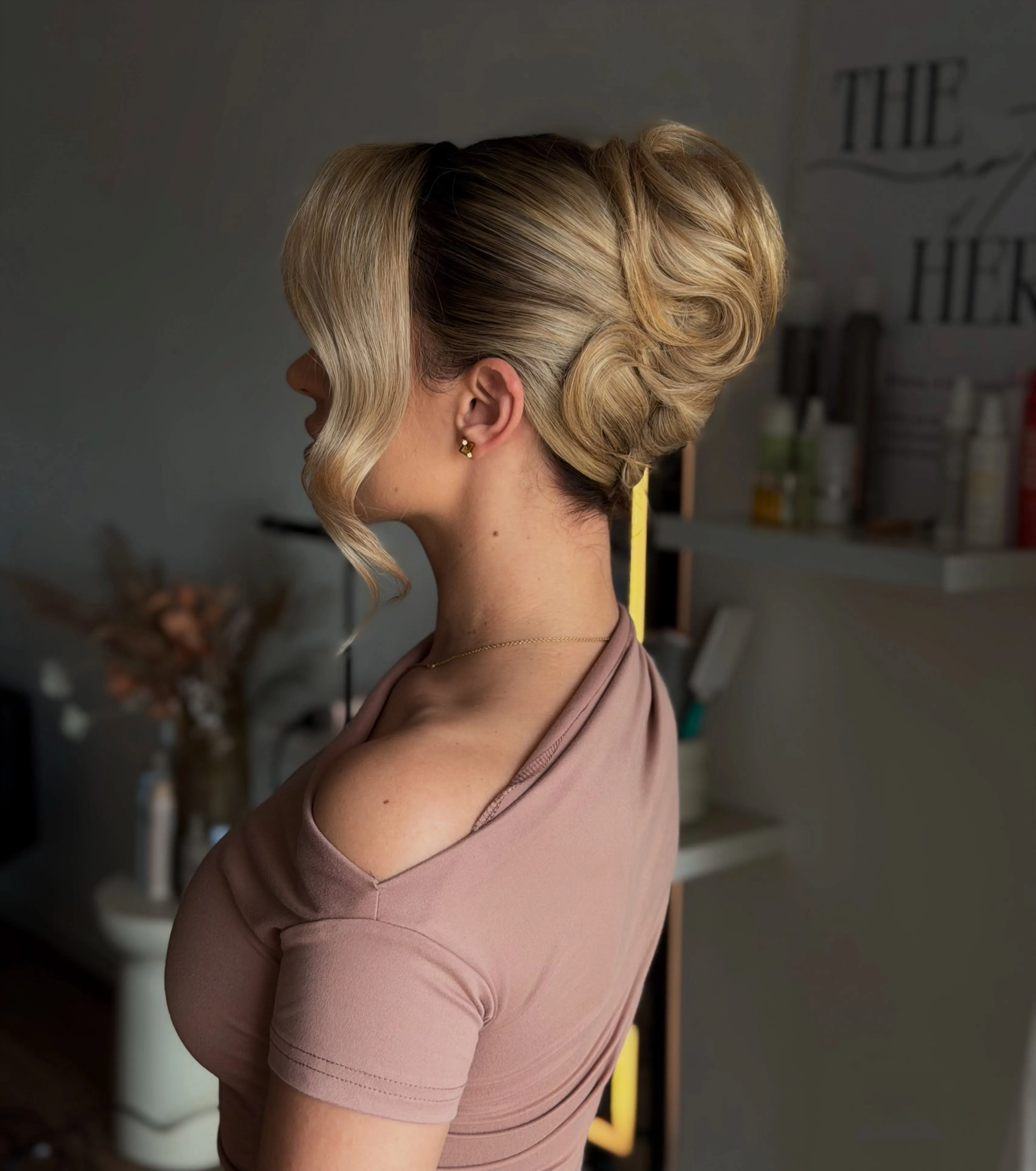 French twist with curled ponytail ends