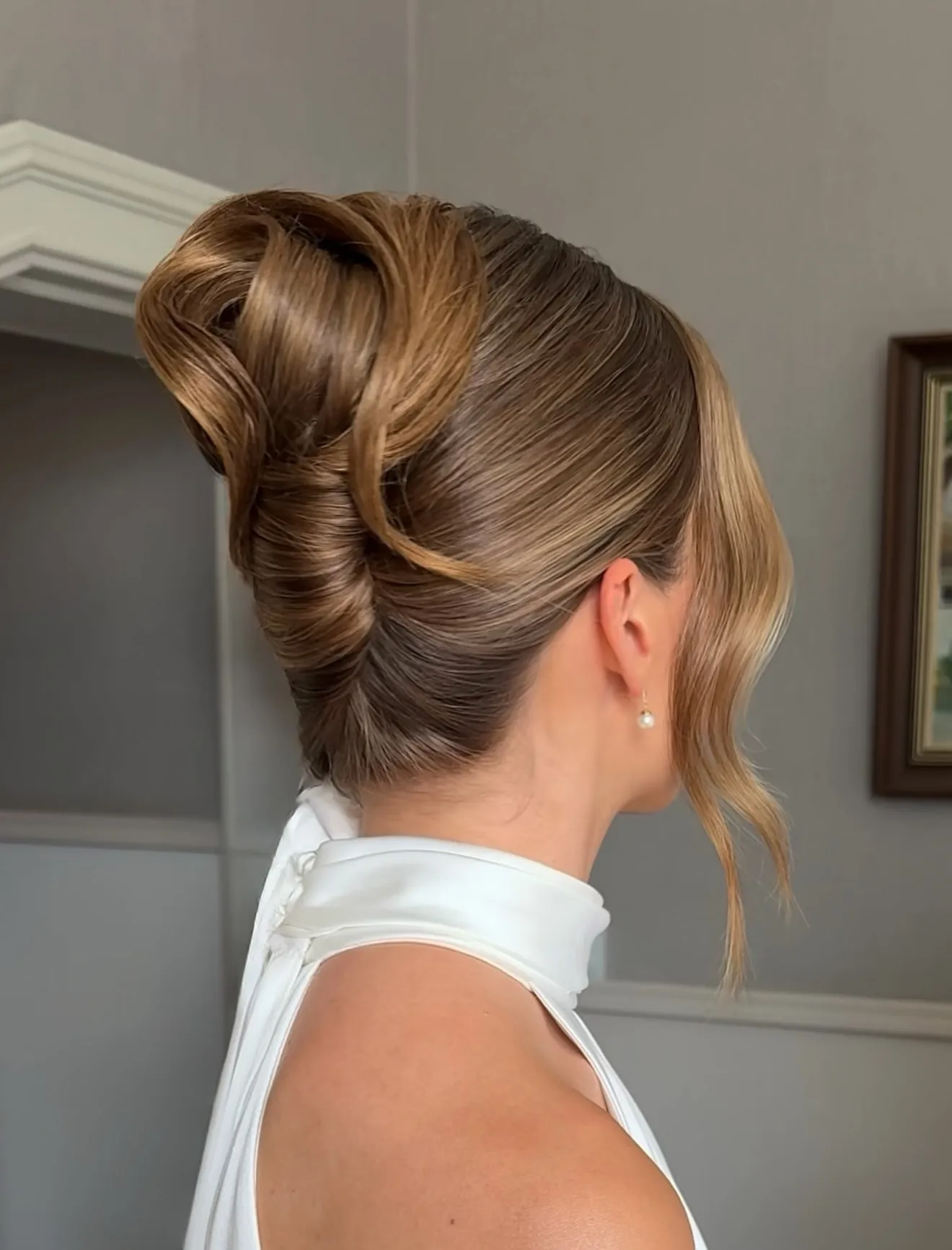 Blonde French twist with visible looped top
