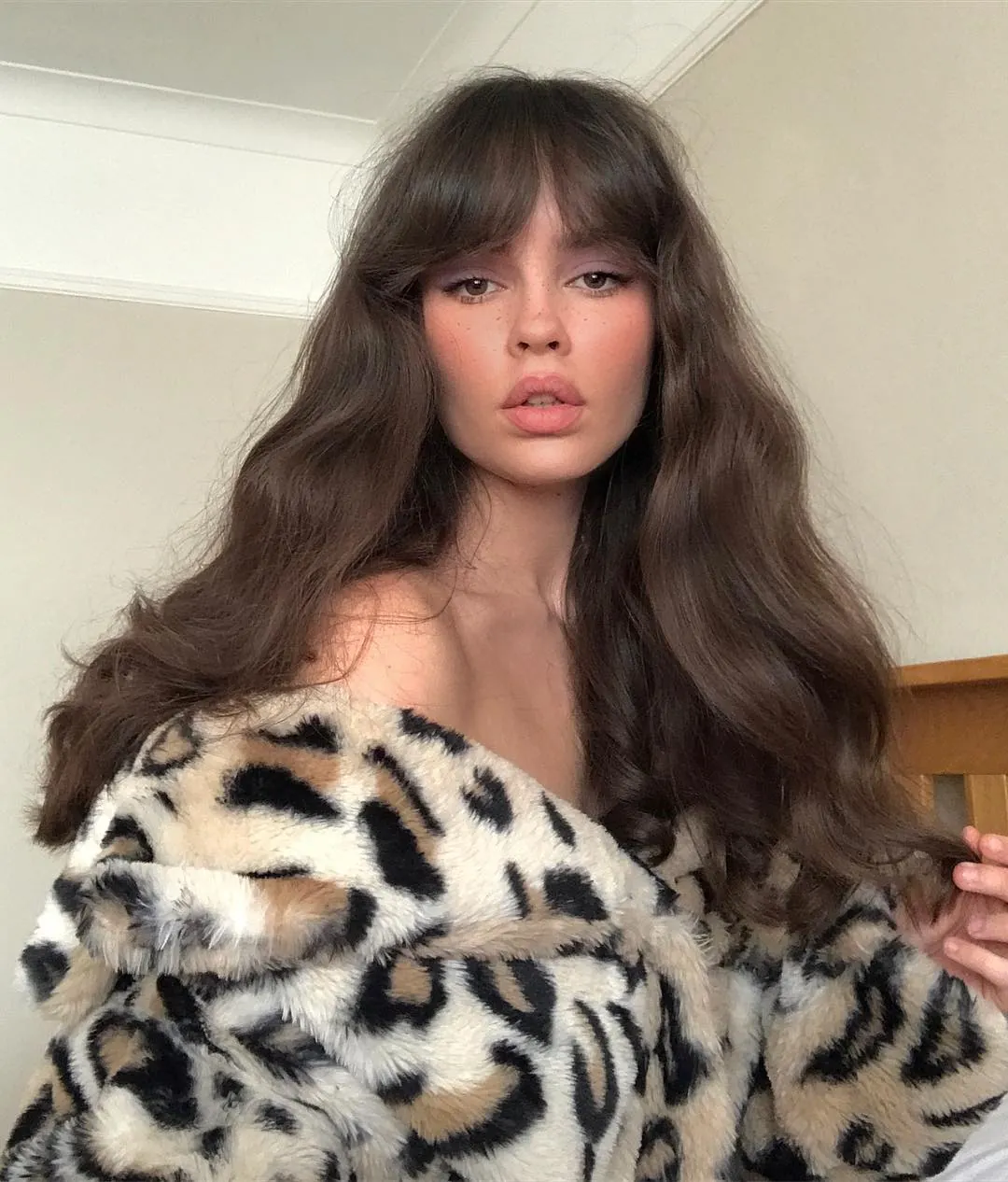 Full Wispy Fringe with light French-inspired fringe