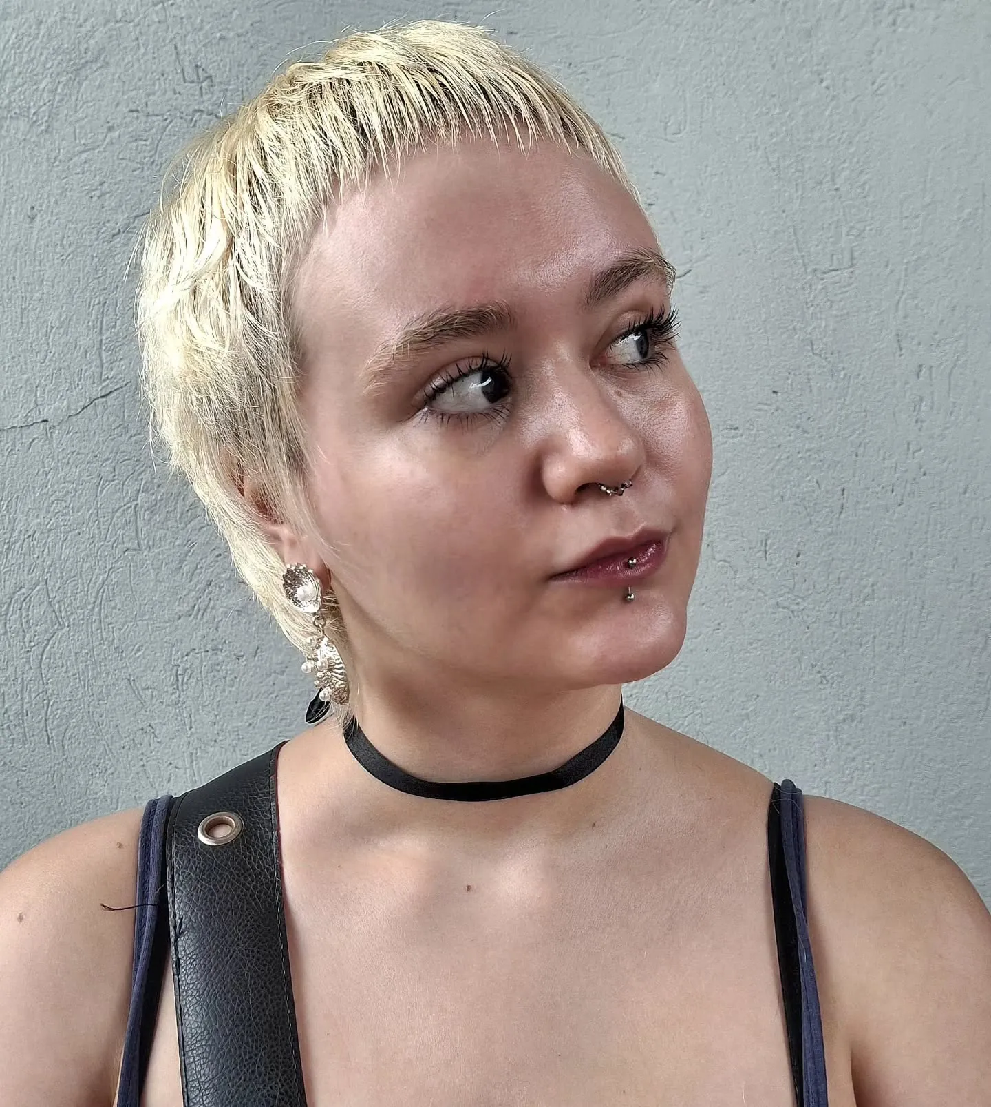 Platinum close-cropped pixie with tiny fringe and neat sides