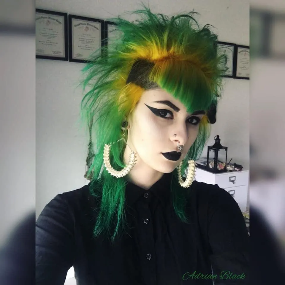 Green and yellow spiked mullet with blunt bangs