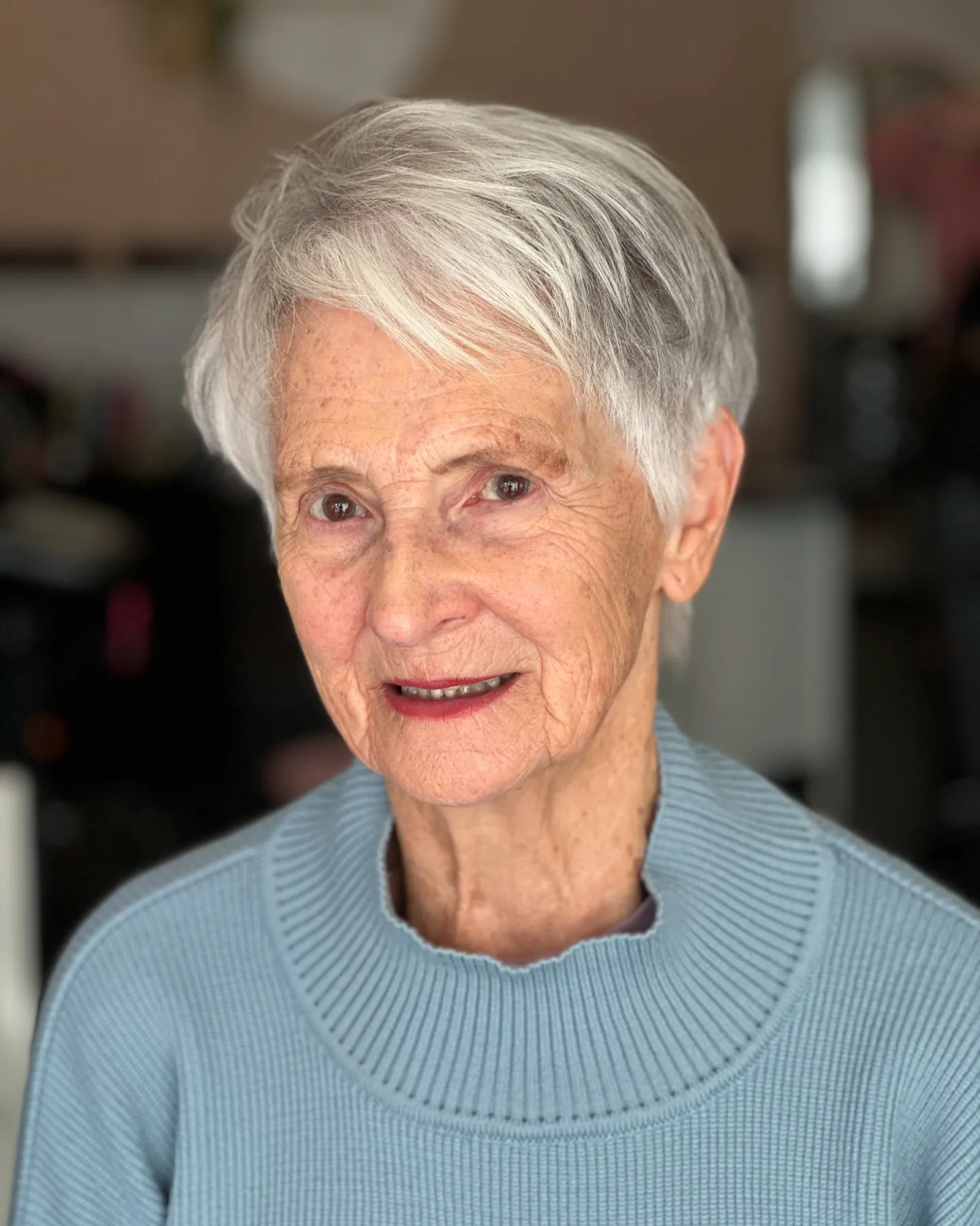 Side-Swept White Pixie in gray and silver hair