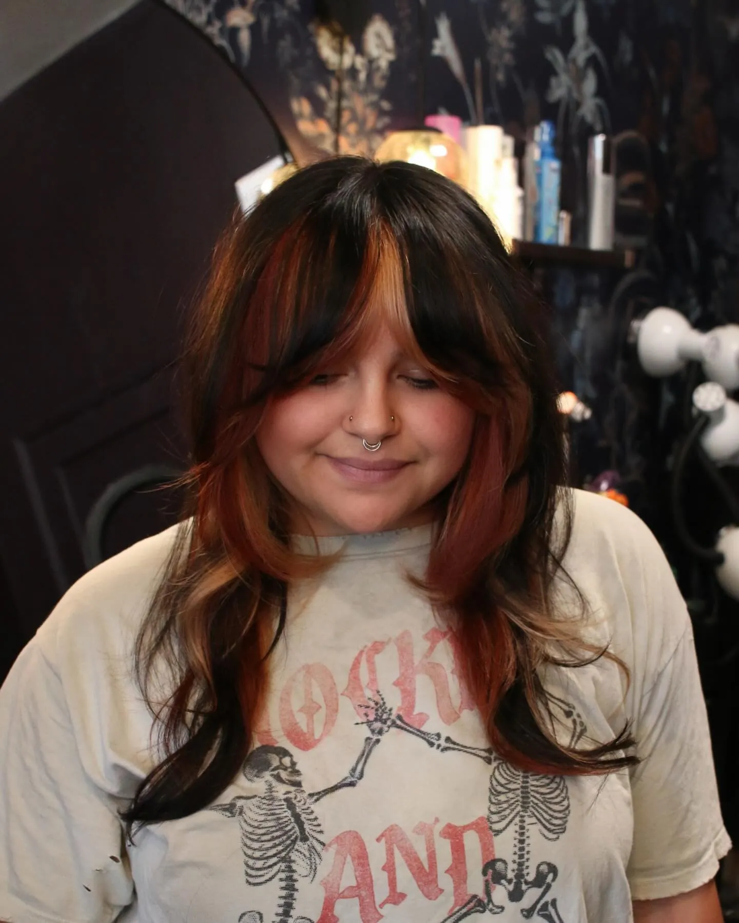 Long halo haircut with curved fringe and face framing