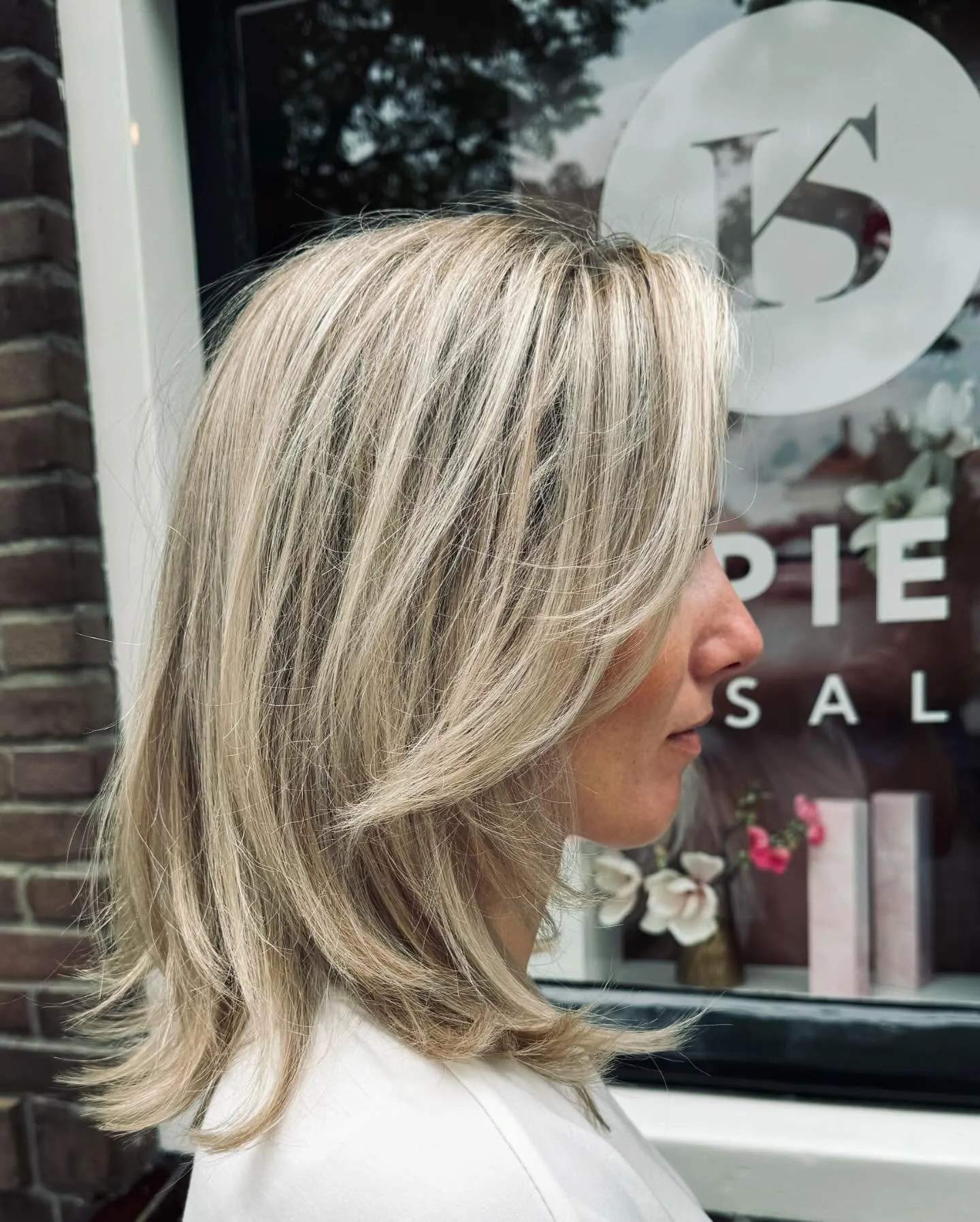 Feathered Blonde Kitty Cut