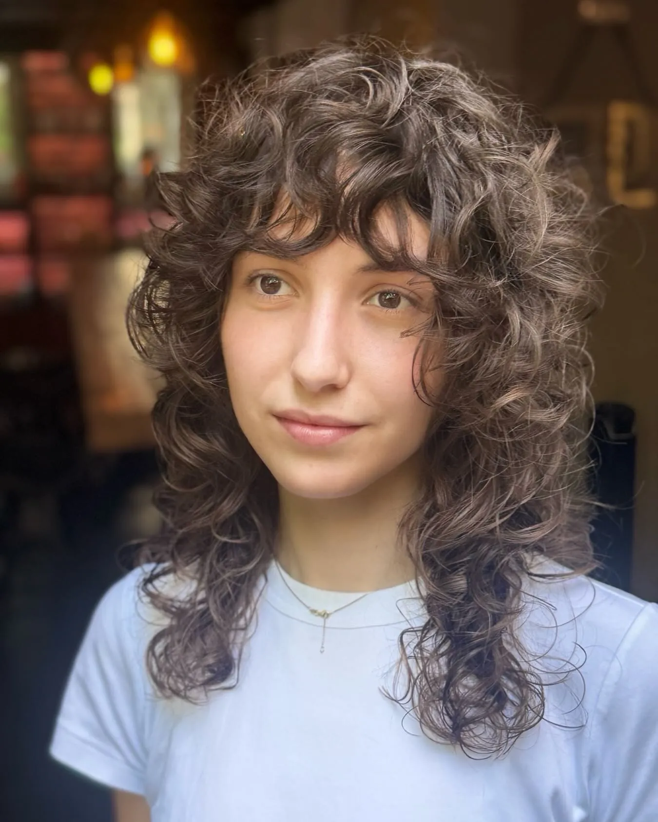 Wispy curly shag with fringe and longer neck layers