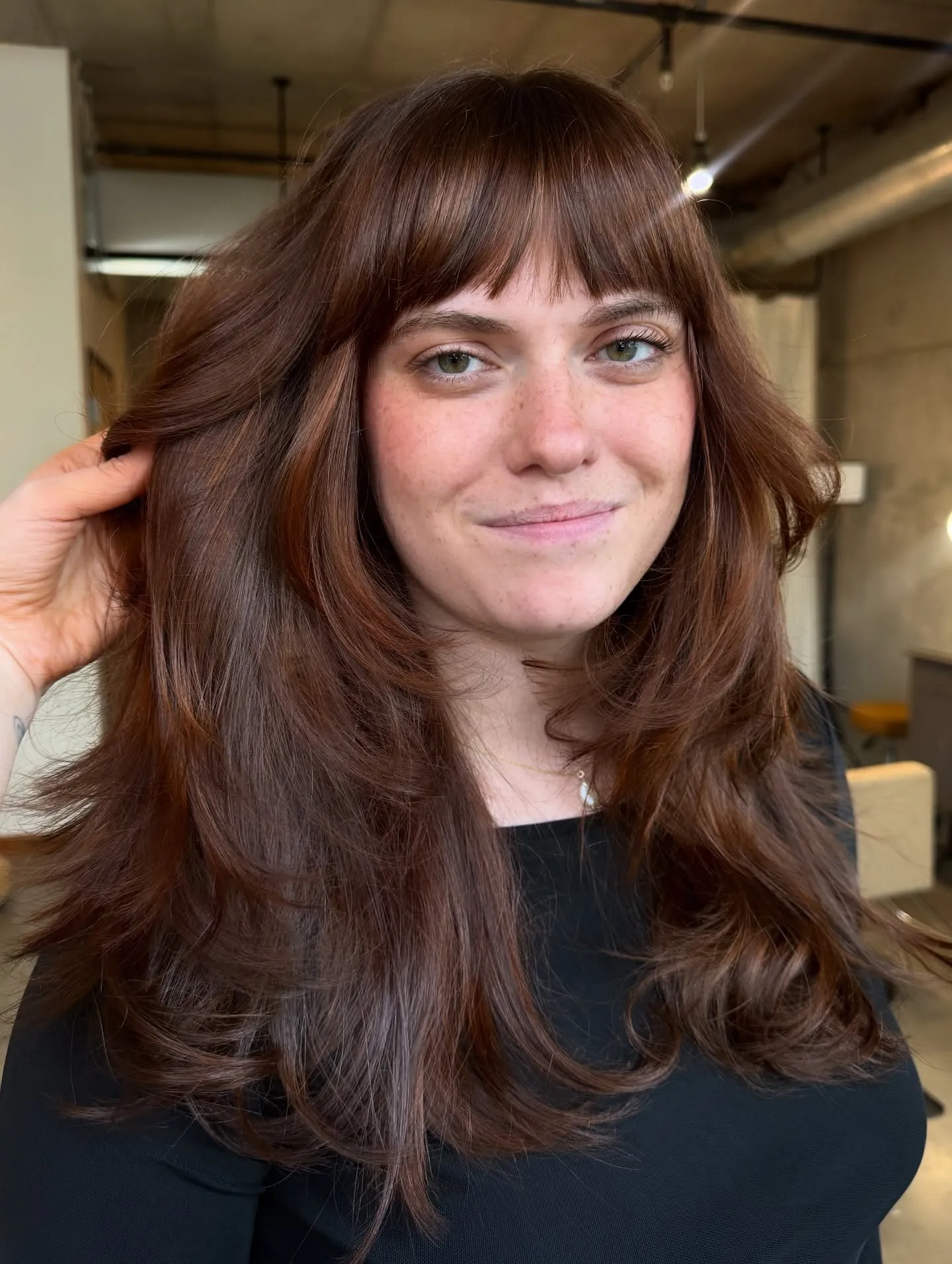 Long soft shag with eyebrow-length bangs