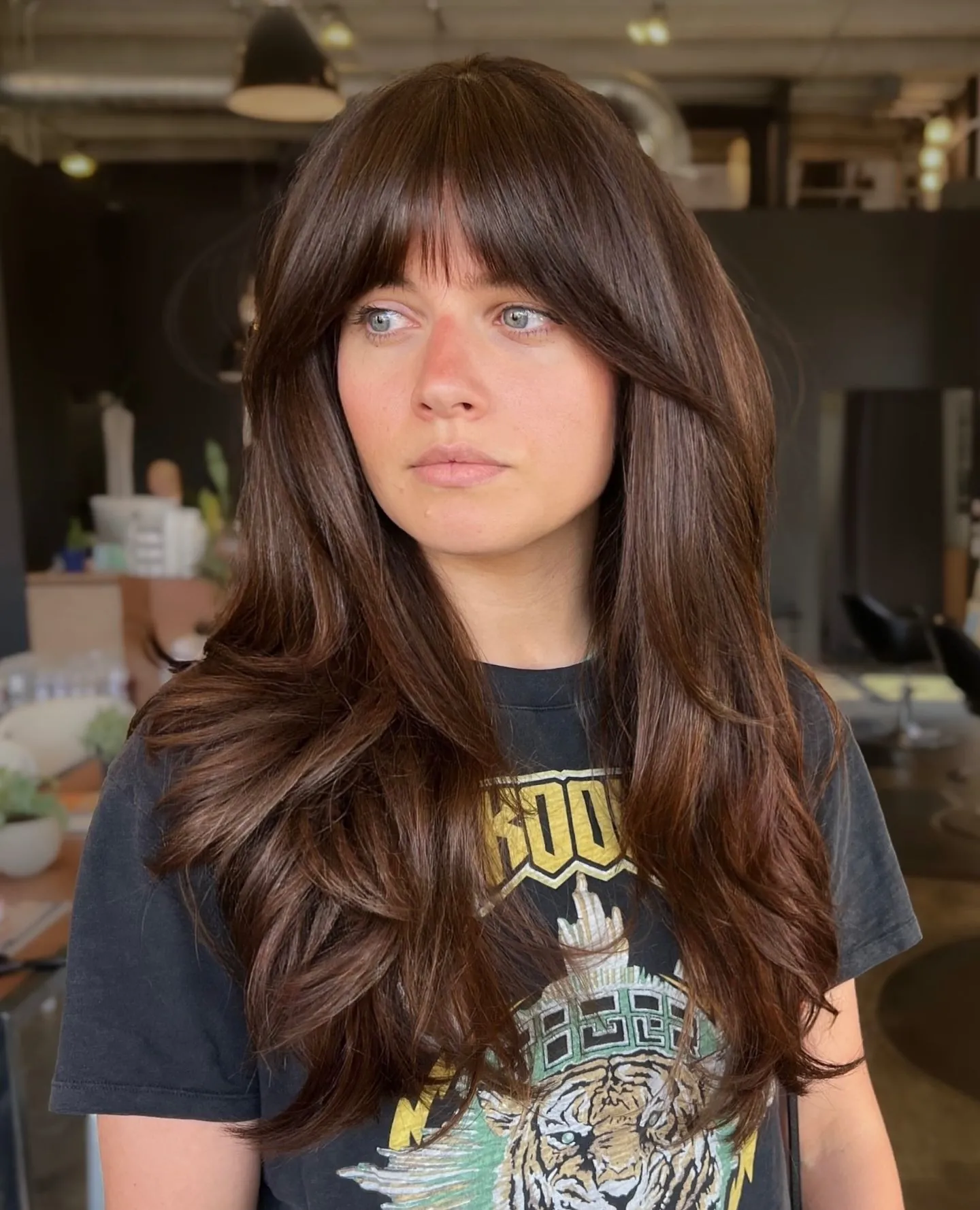 Long dark layers with rounded full bangs
