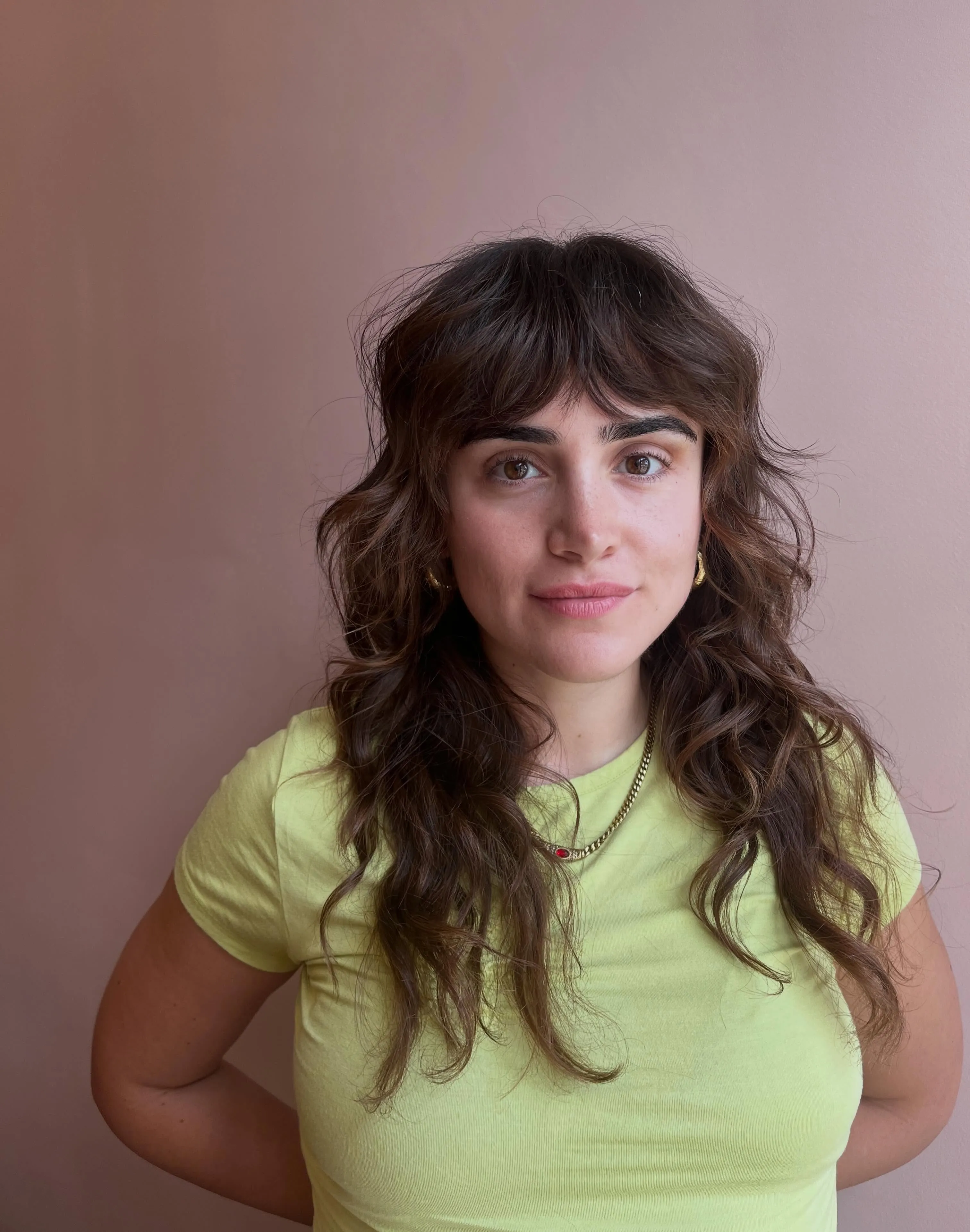Long wavy shag with full fringe and face-framing layers
