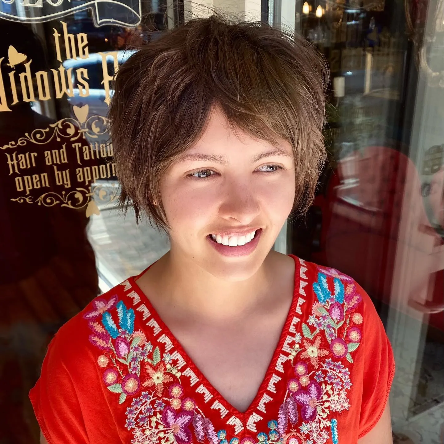 Soft rounded layered pixie with wispy fringe