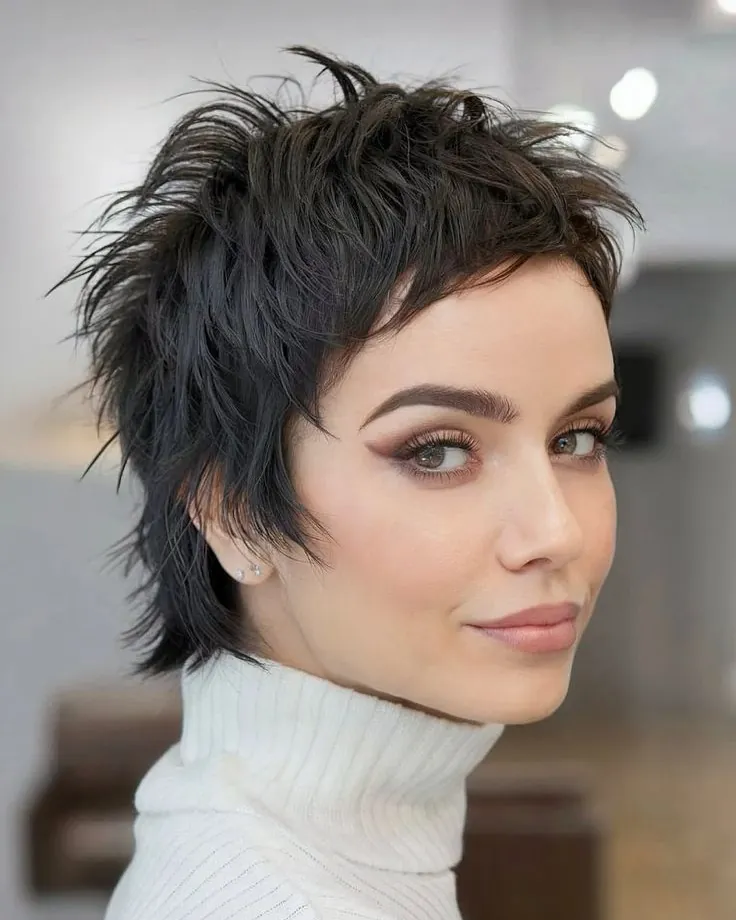 Choppy spiked pixie with textured crown and side fringe