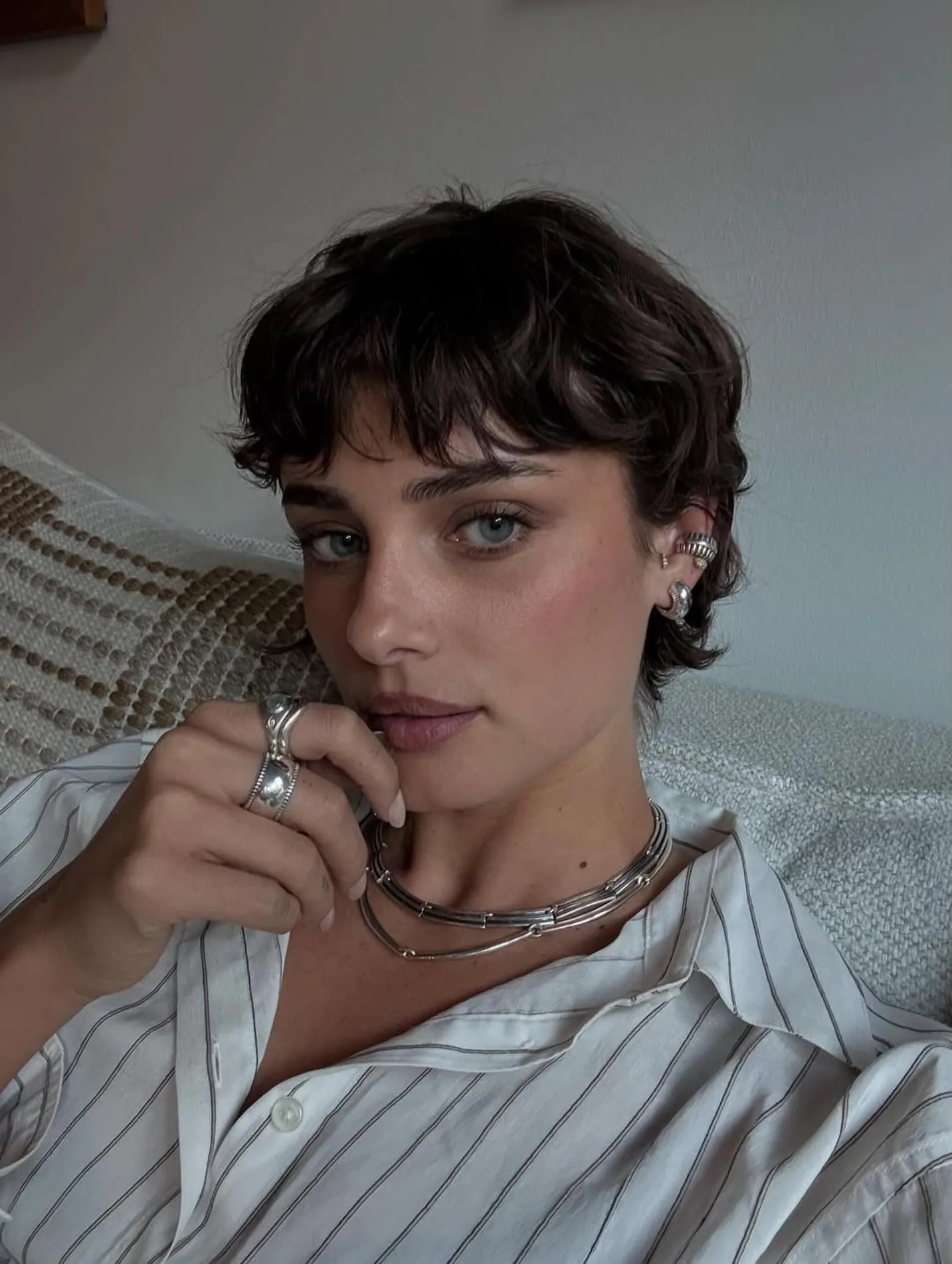 Curly layered pixie with short micro fringe