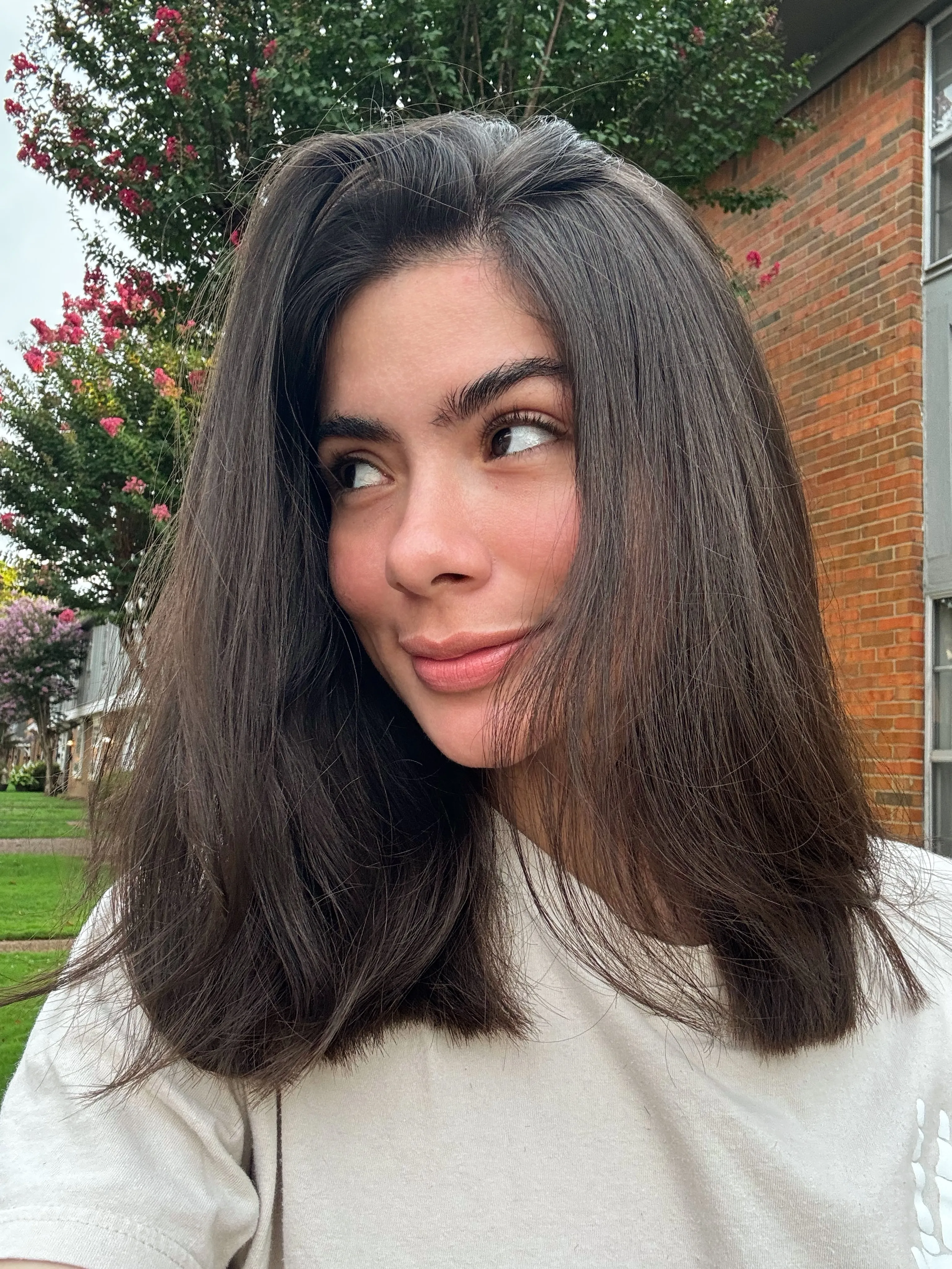 Brunette side-part long bob with soft volume and full ends