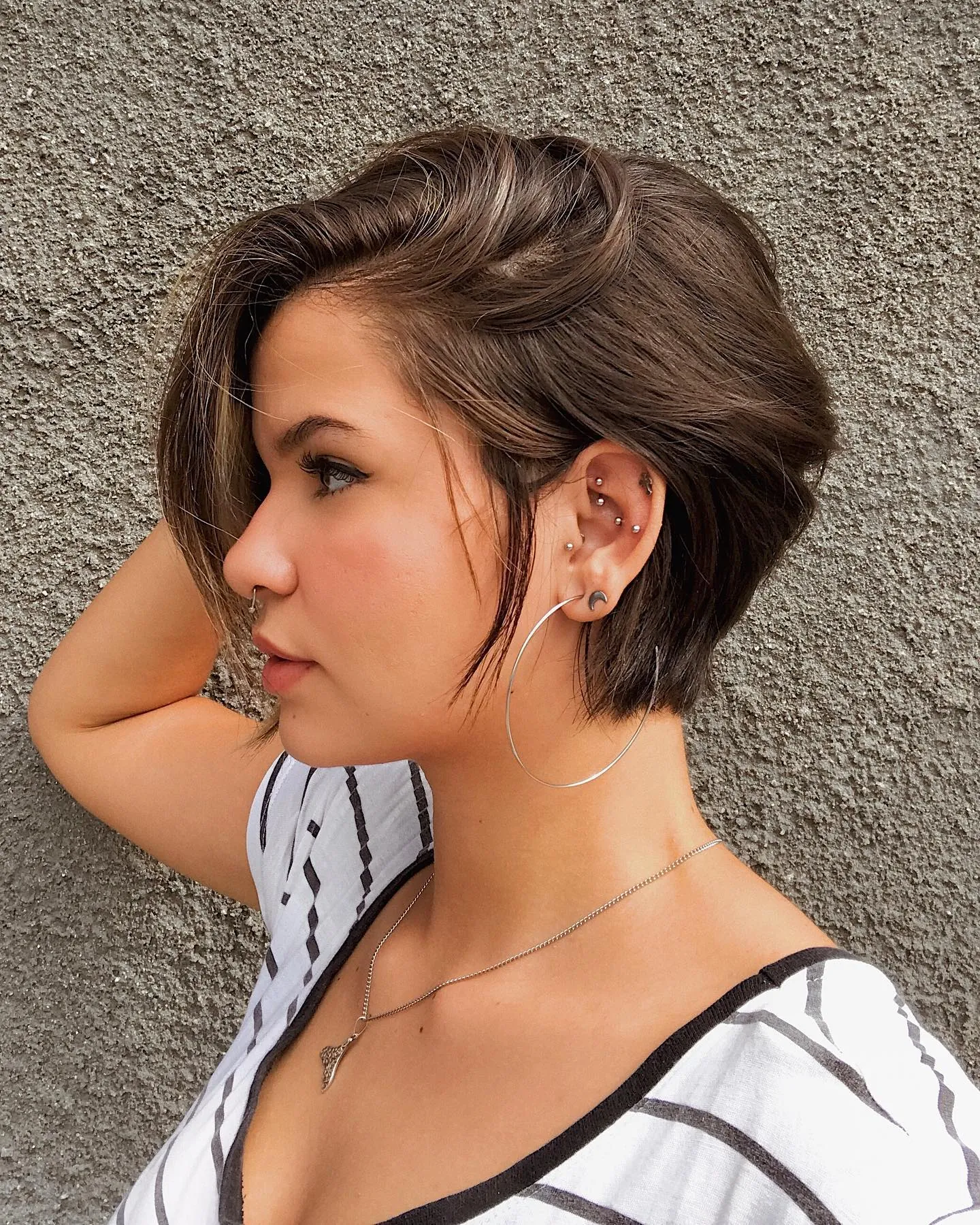 Side-swept tapered long pixie with a short nape