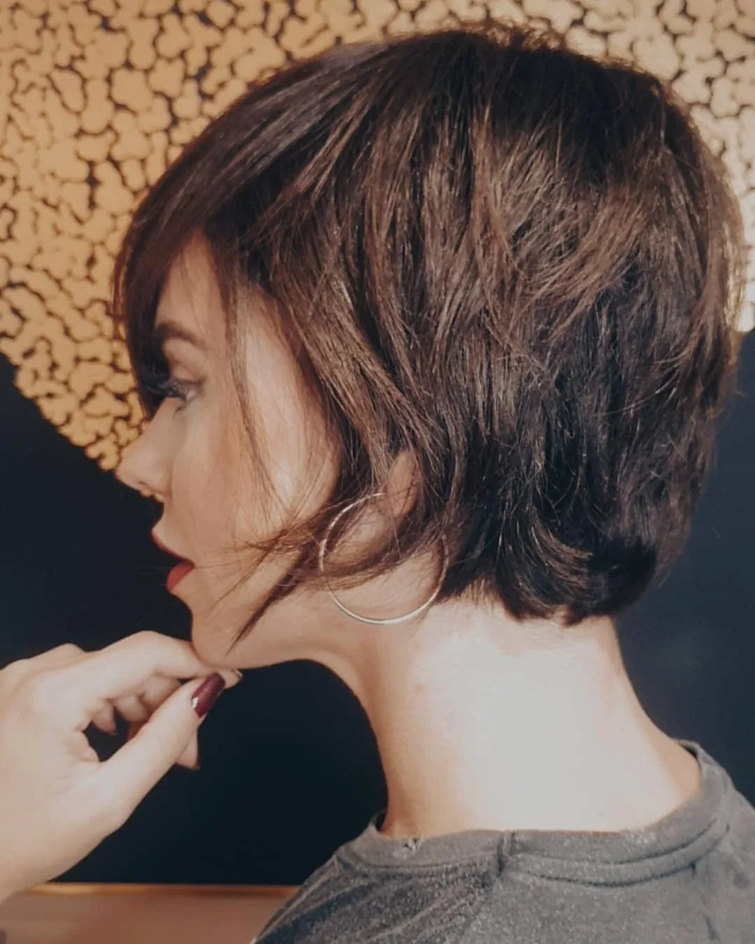 Long pixie with side fringe and stacked nape