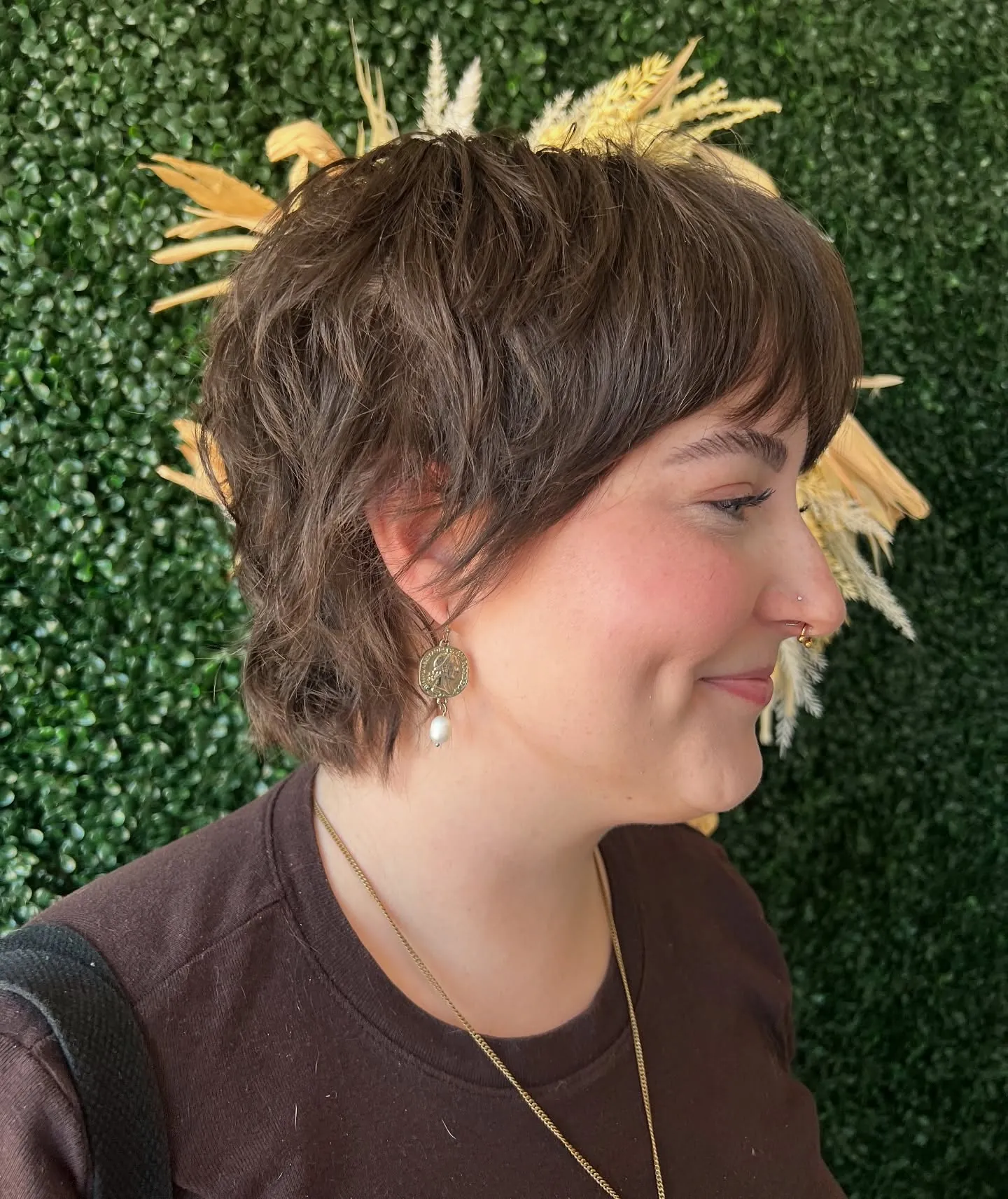 Feathered brown long pixie with soft fringe