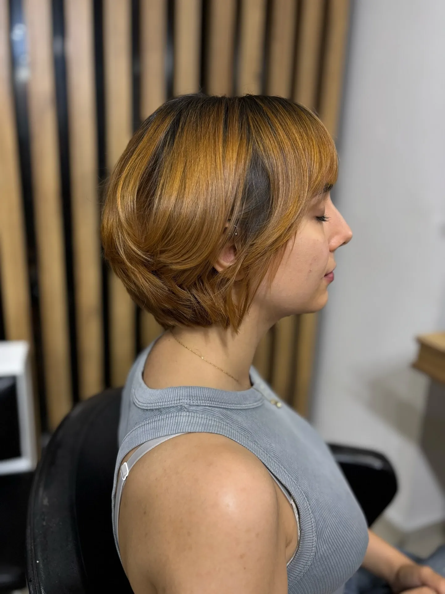Rounded long pixie bob with curved sides