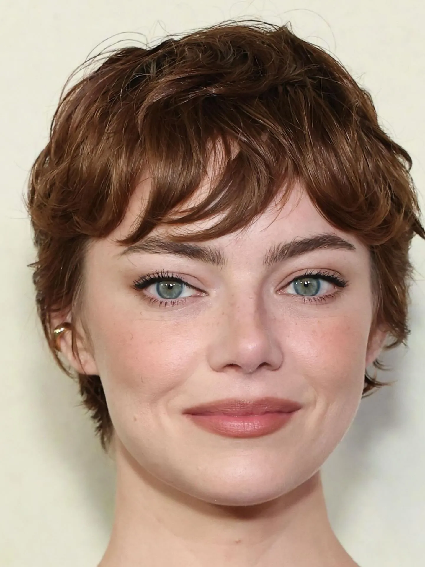 Auburn long pixie with wispy fringe
