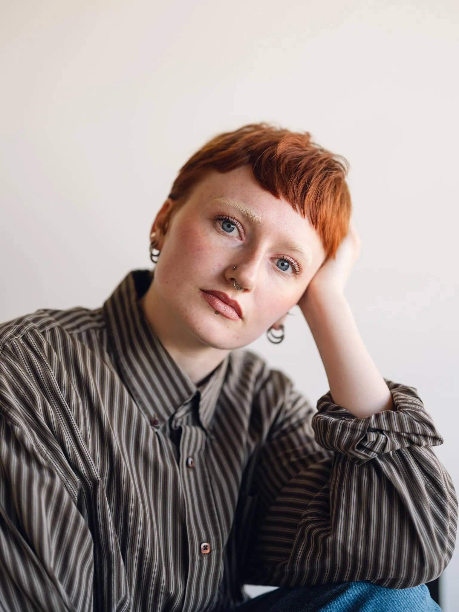 Very short copper pixie with tiny fringe