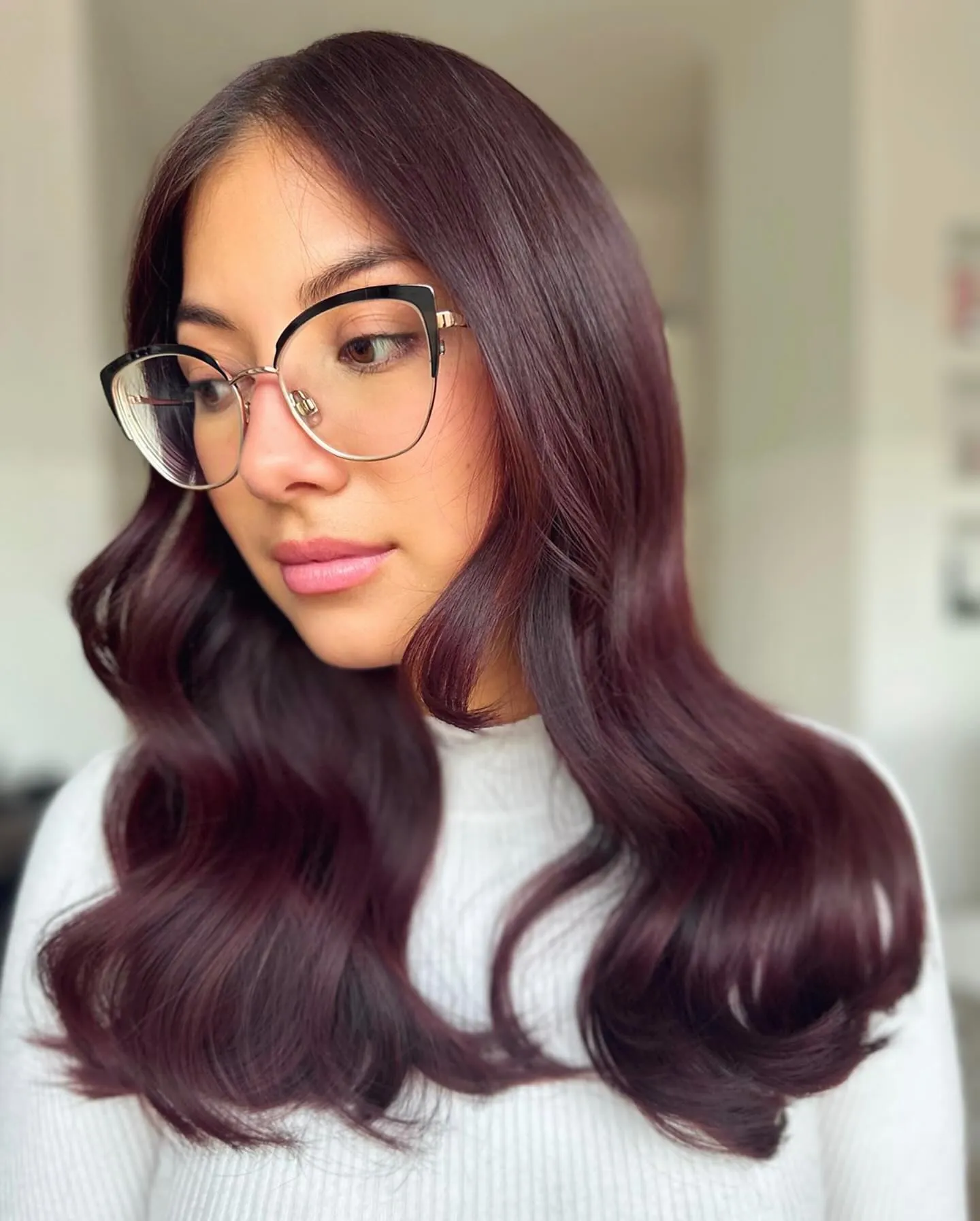 Sleek Plum-Mahogany Lob showing mahogany hair colour
